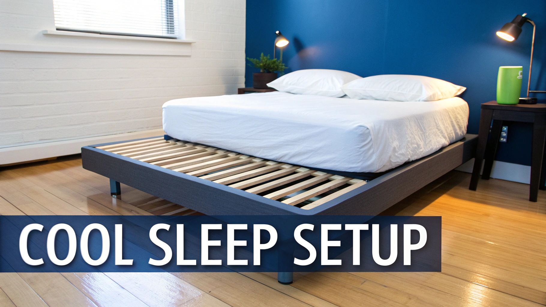 A modern bedroom with a bed featuring a white mattress, pillows, and a blue wall. Includes a cooling sleep setup.