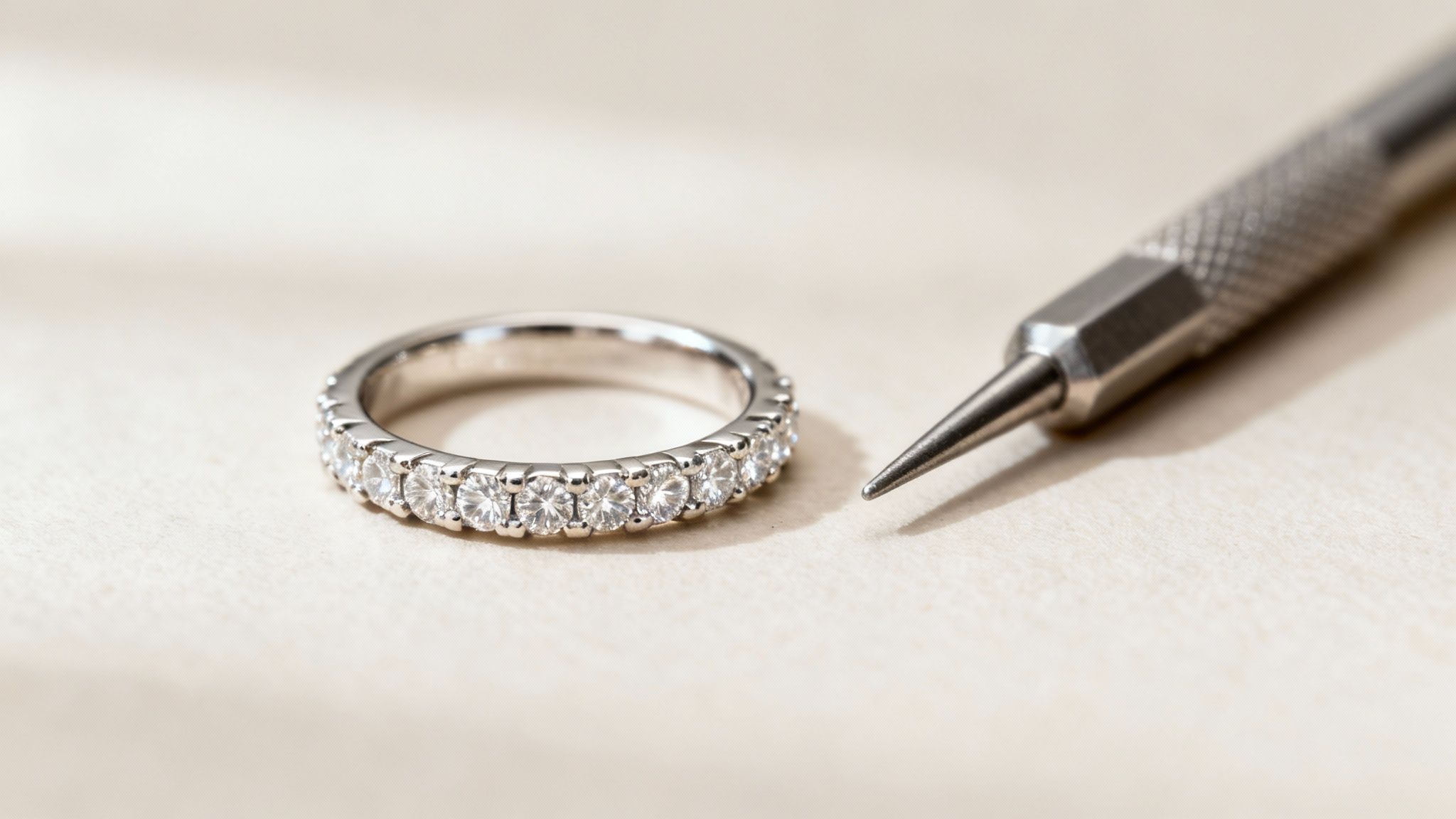 An intricate eternity ring with a continuous band of diamonds, highlighting its complex design.
