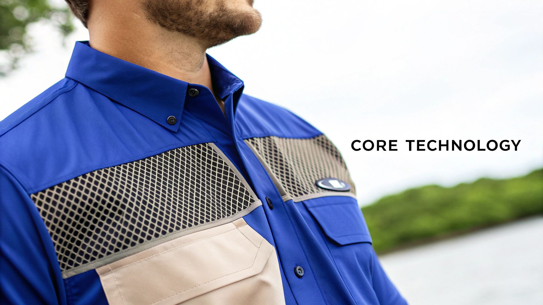 A close-up of a high-performance fishing shirt showing fabric texture and a logo.