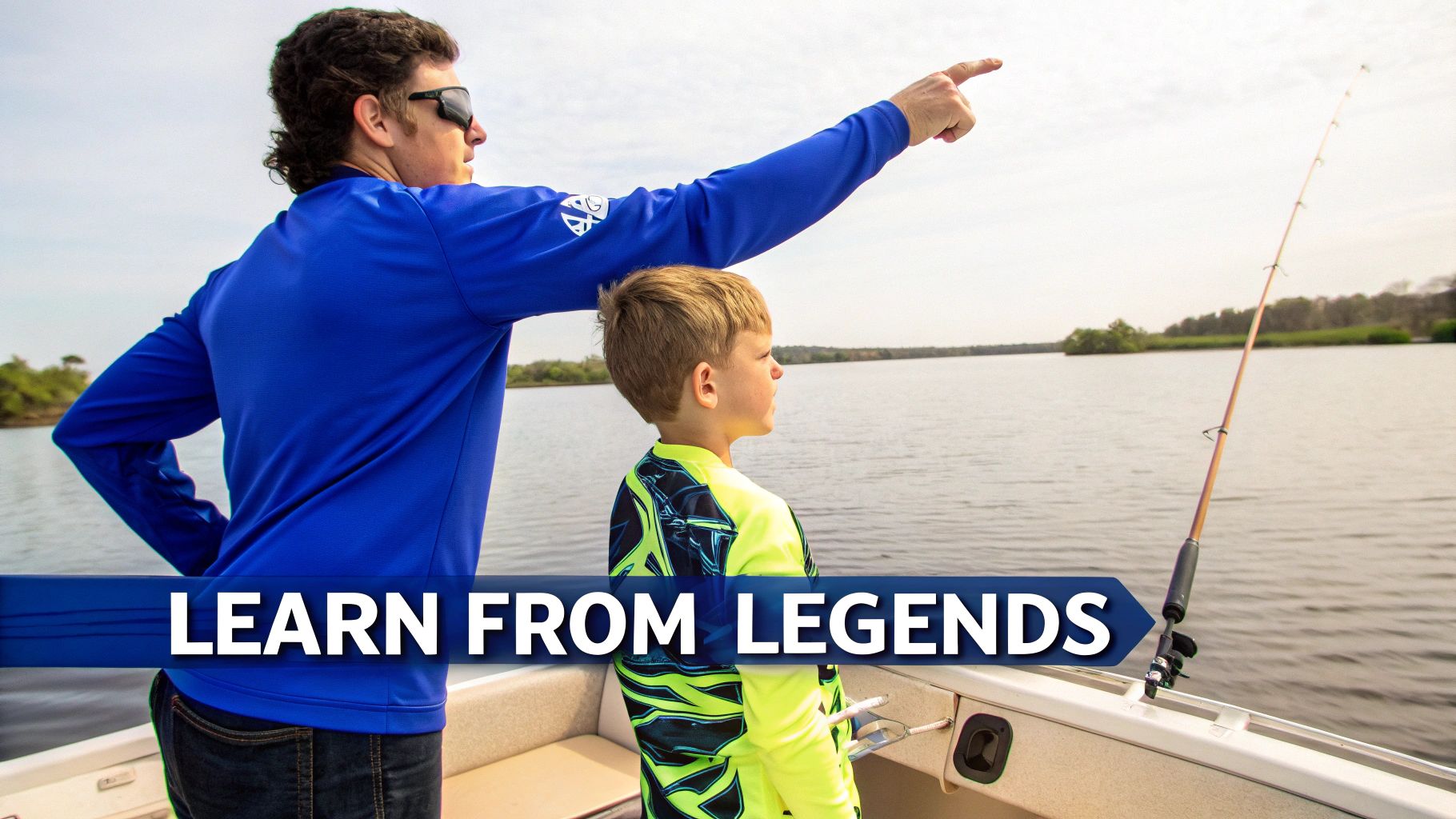 A man teaches a boy wearing a vibrant youth fishing shirt how to fish from a boat.