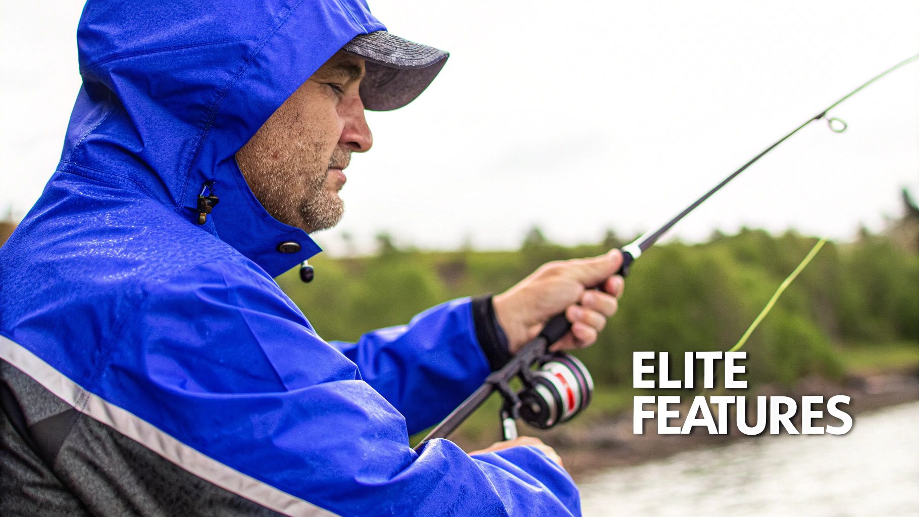 Angler wearing high-performance fishing rain gear and reeling in a fish.