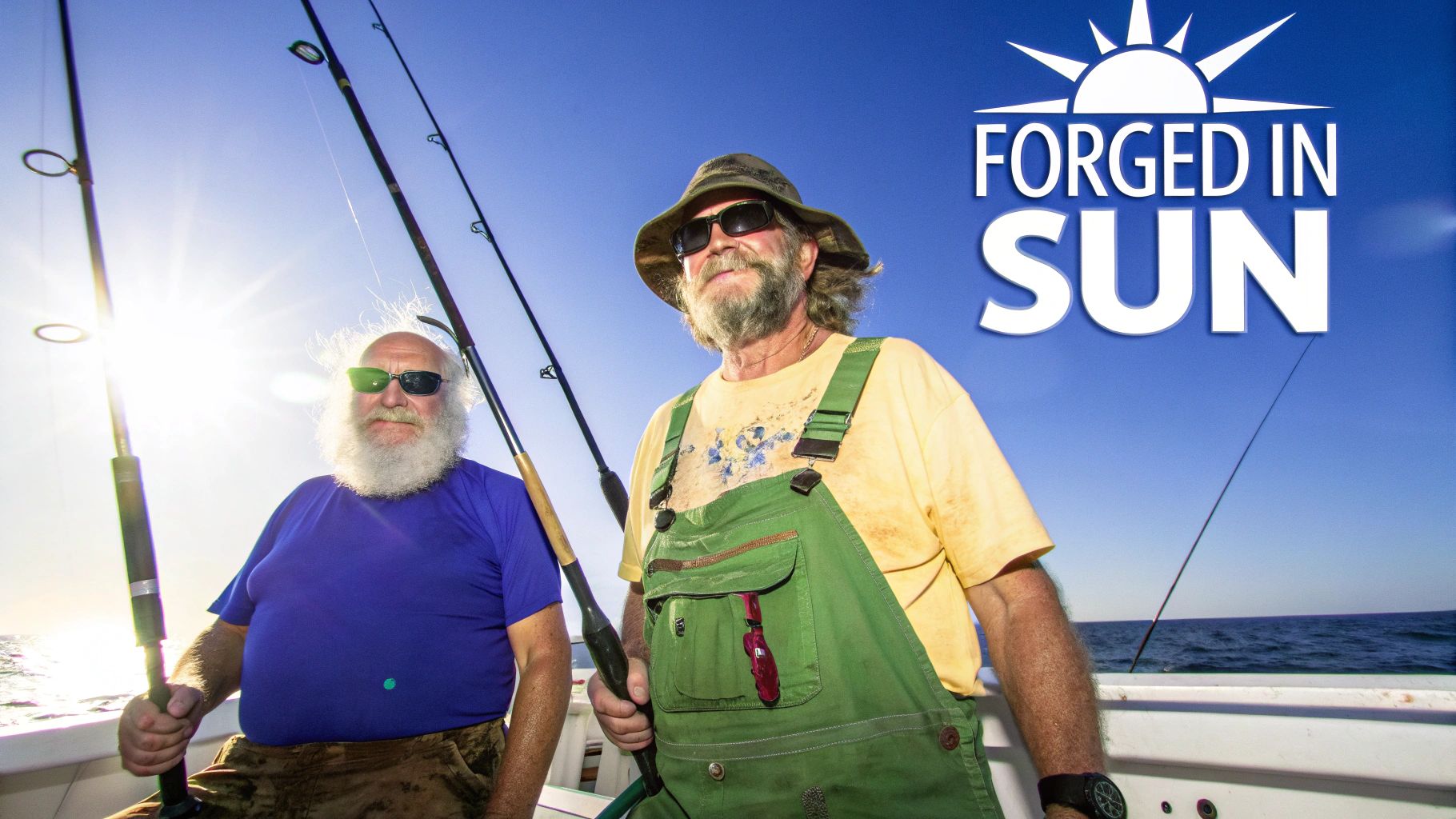 Two bearded men wearing sunglasses are happily fishing from a boat under a bright sun.