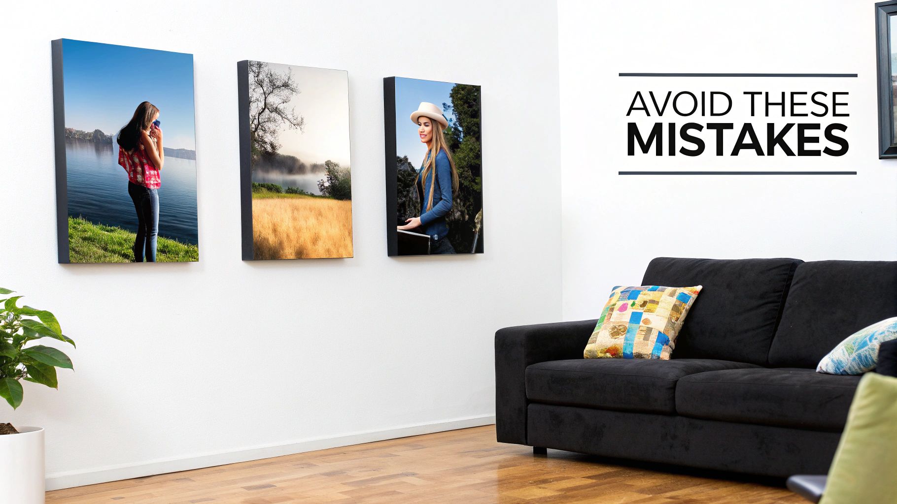 A canvas print of a beach scene hanging on a light gray wall next to a leafy green plant.