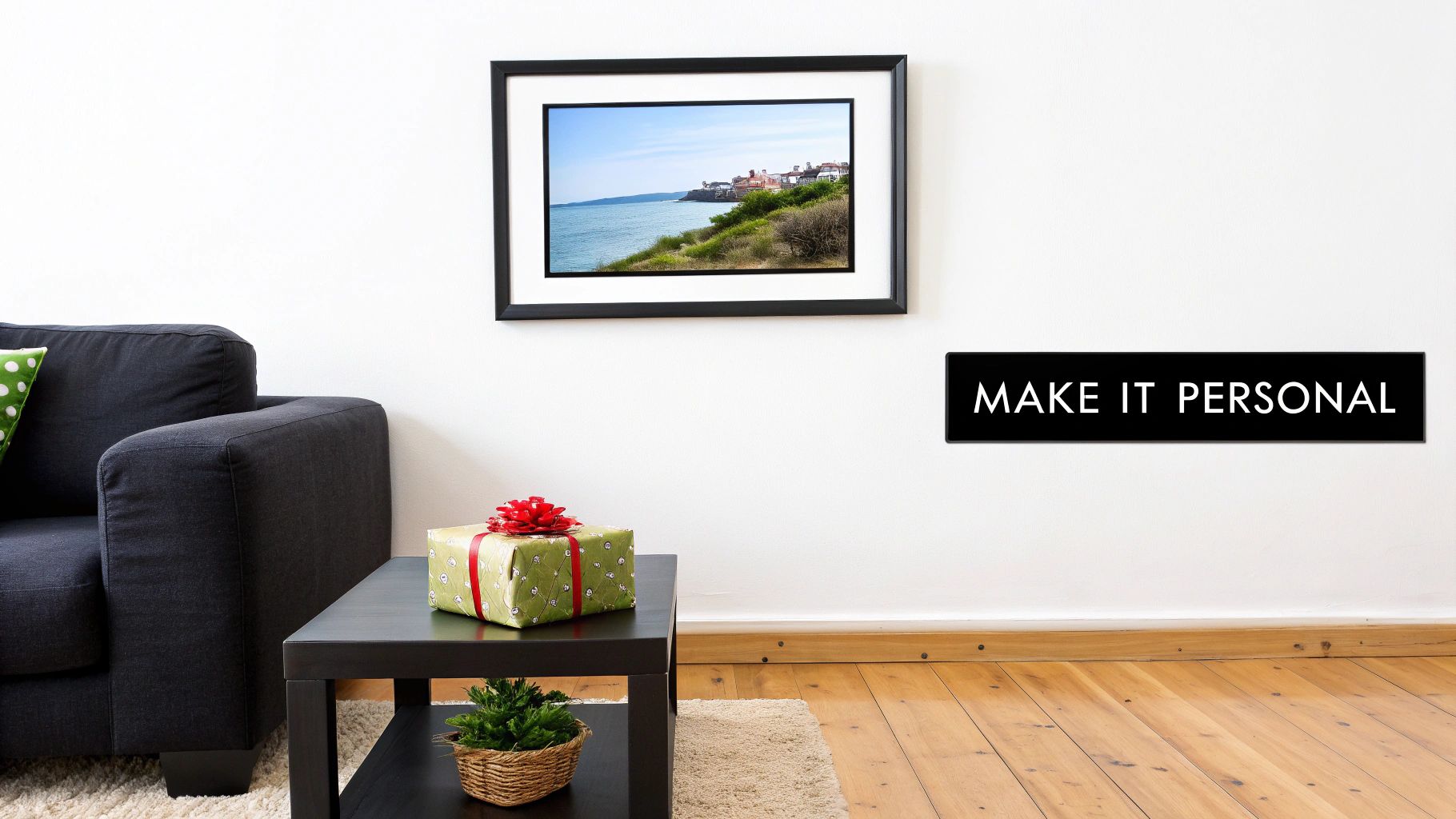 A couple looking happily at a custom photo print hanging on their wall.