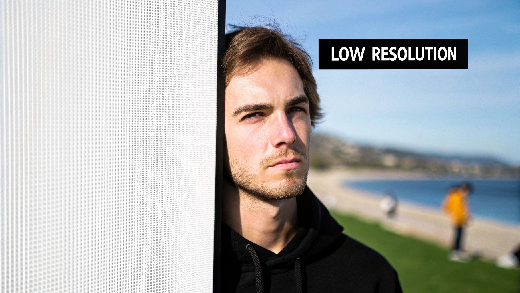 A photo being edited on a computer screen, with a finished canvas print of the same image sitting next to it.