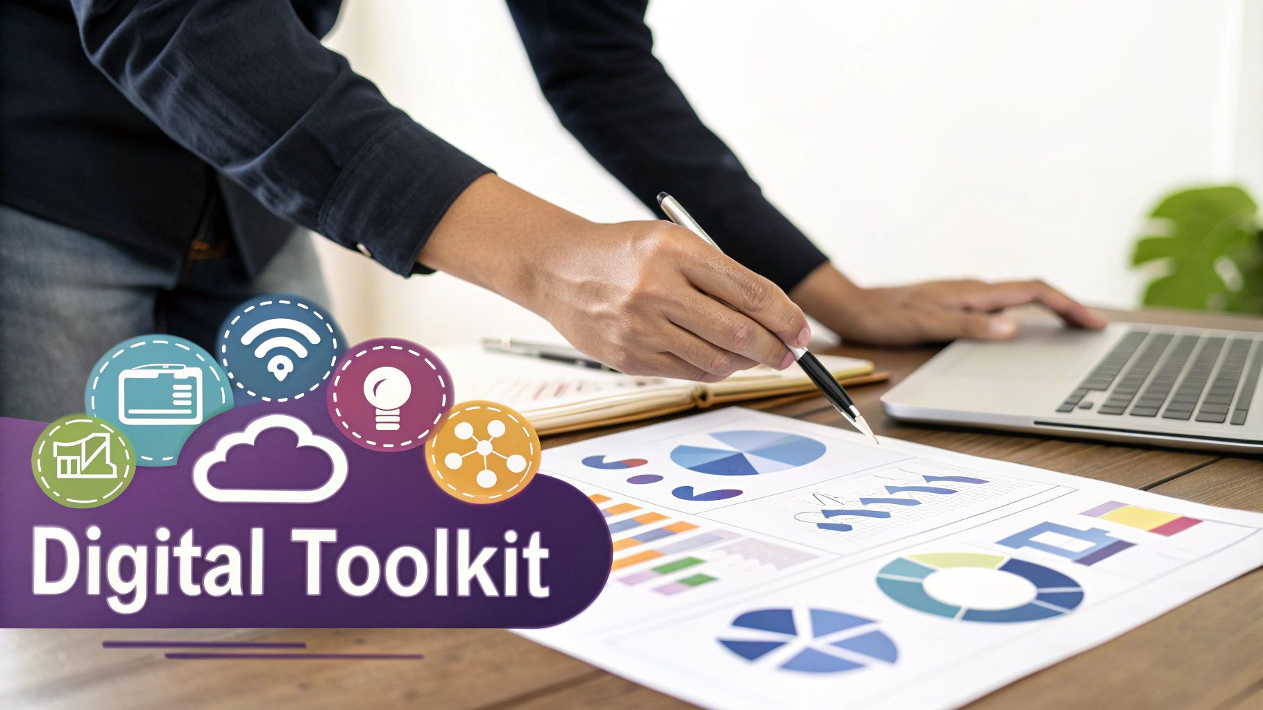 A professional points at data analytics charts, utilizing a laptop and a digital toolkit.