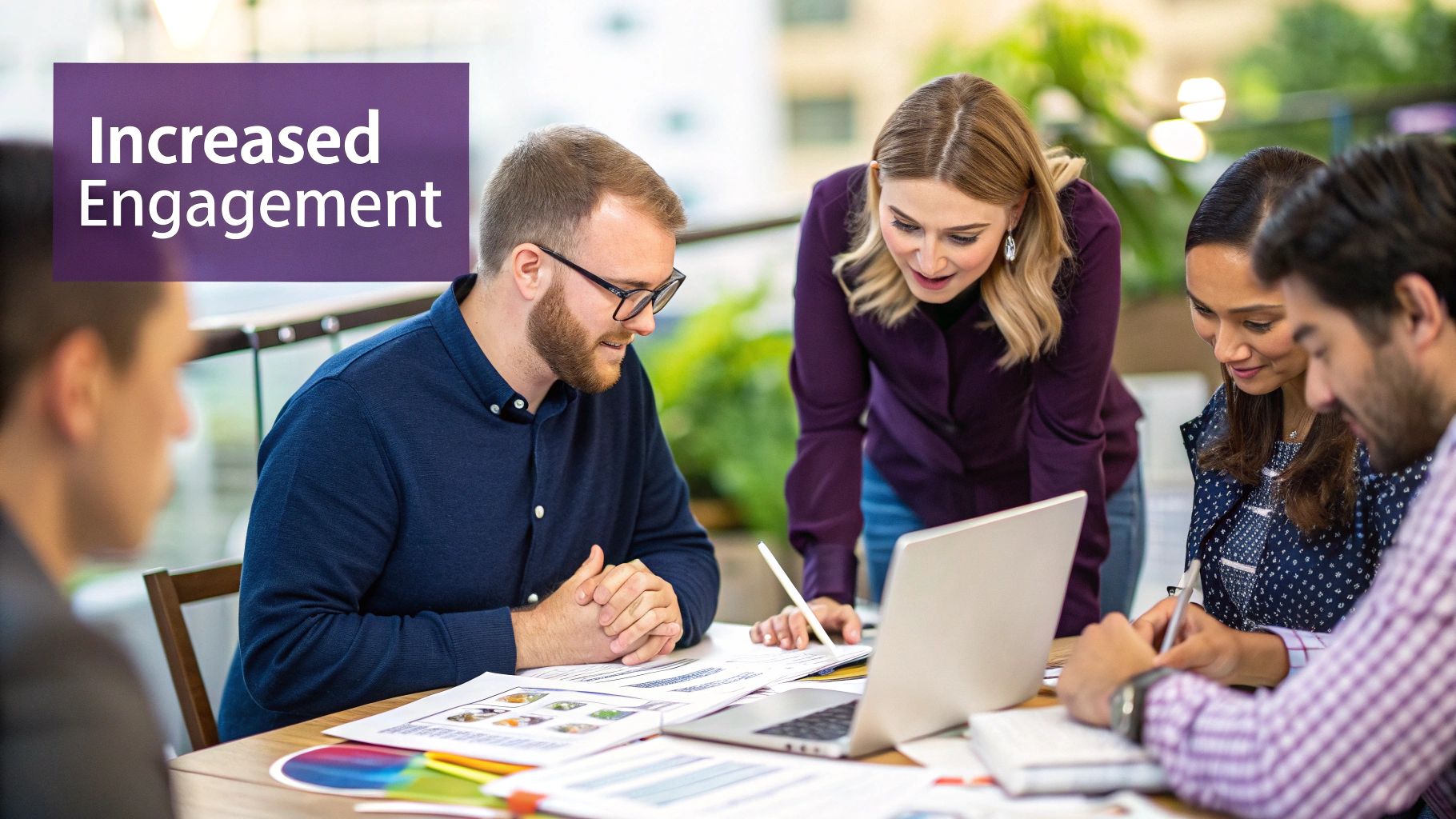 A group of diverse business professionals collaborating on a marketing strategy in a modern office setting.