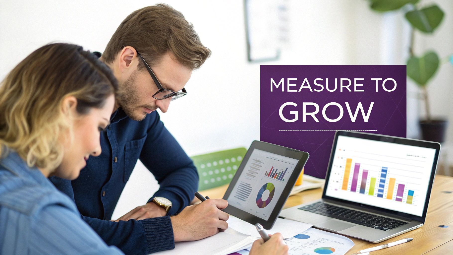 Two professionals analyze marketing data and charts on a laptop and tablet, emphasizing growth.