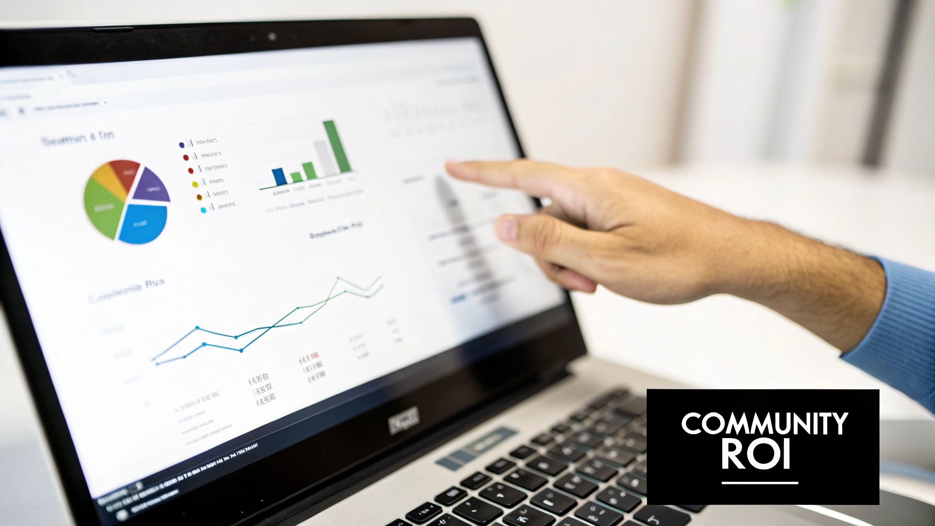 A person's hand points at a laptop screen displaying various charts and graphs, analyzing community ROI.