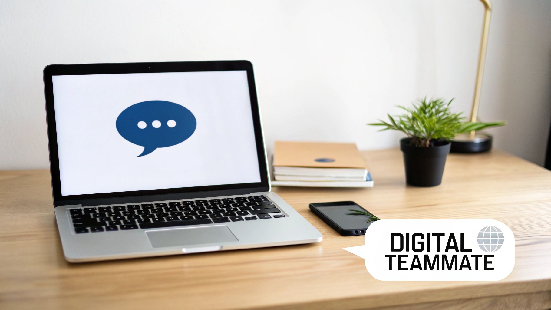 Laptop displaying a chat bubble icon, smartphone, books, and 'DIGITAL TEAMMATE' speech bubble on a desk.