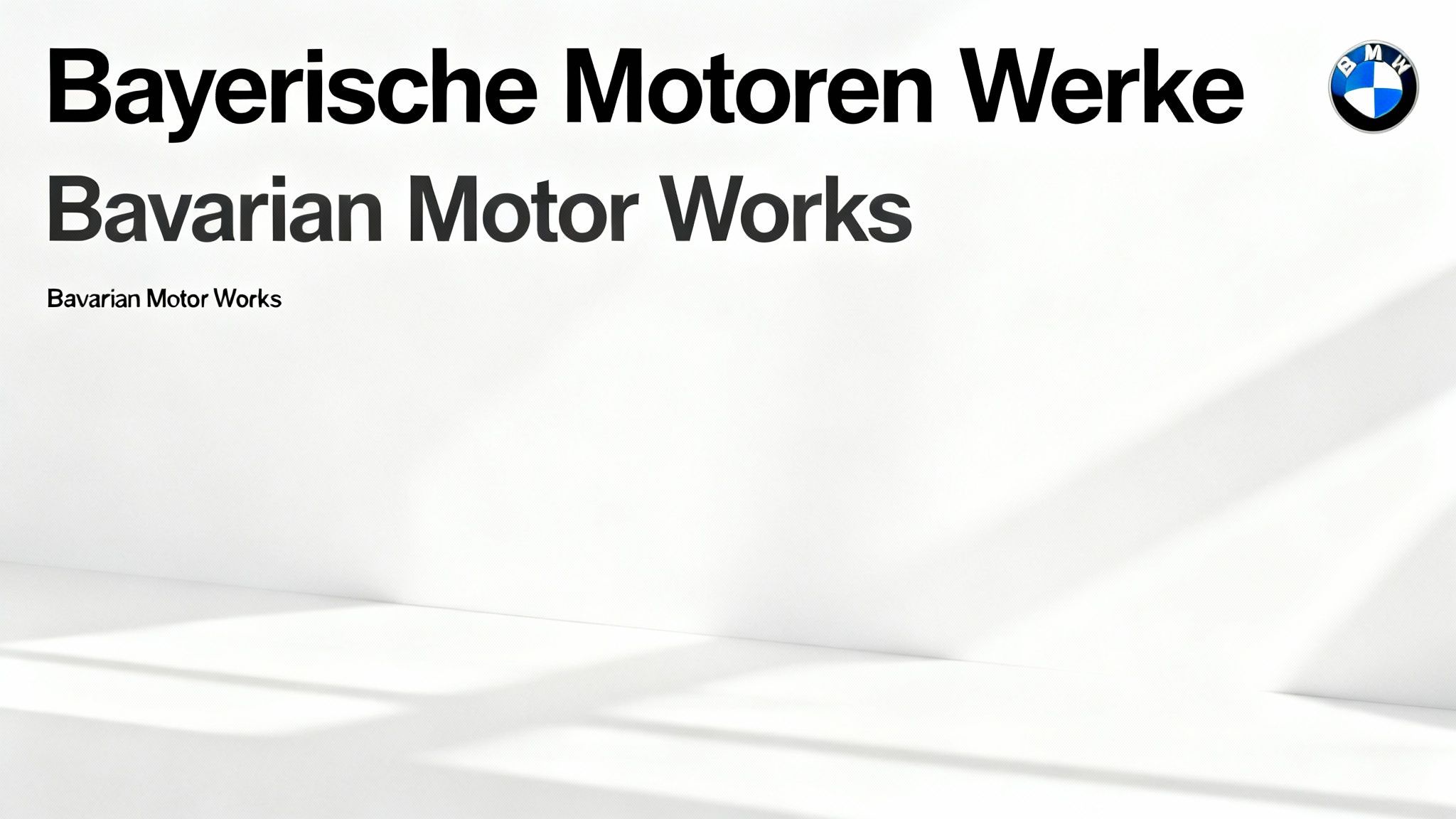 A modern white BMW parked in front of a sleek, contemporary building, representing luxury and design.