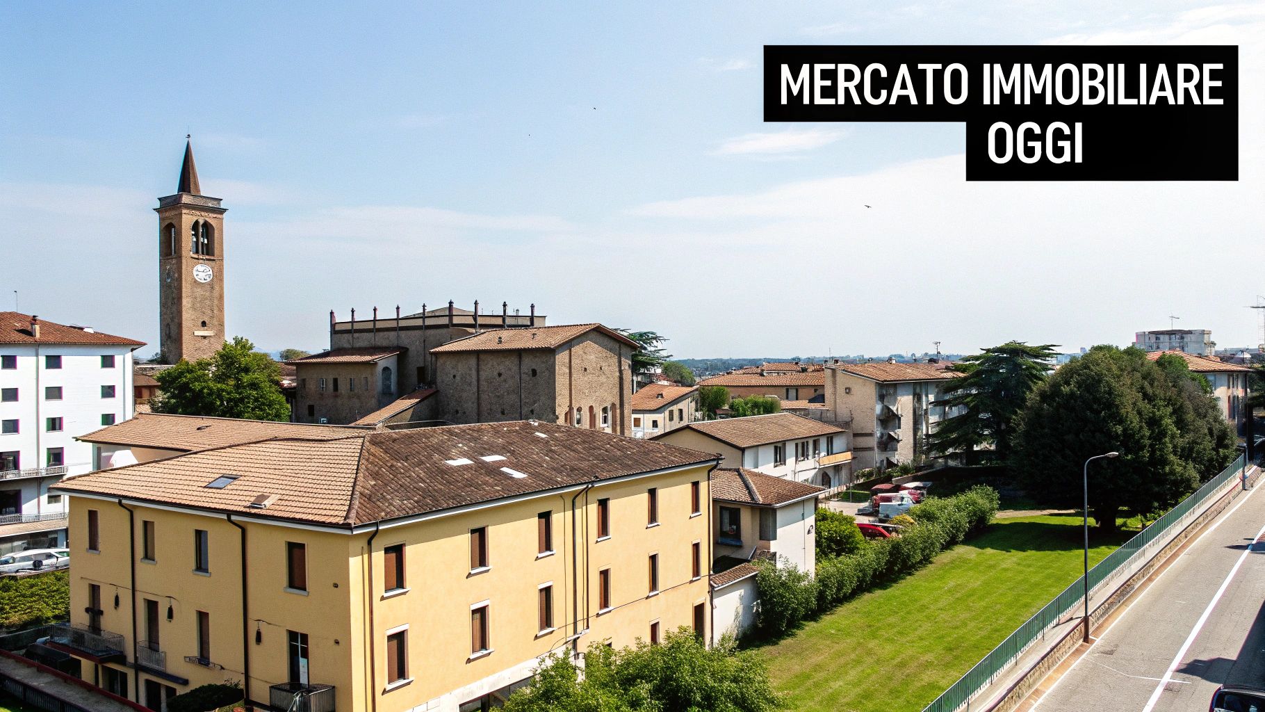 Veduta aerea di un paese italiano con campanile, edifici tradizionali, strada e aree verdi, con testo sul mercato immobiliare.