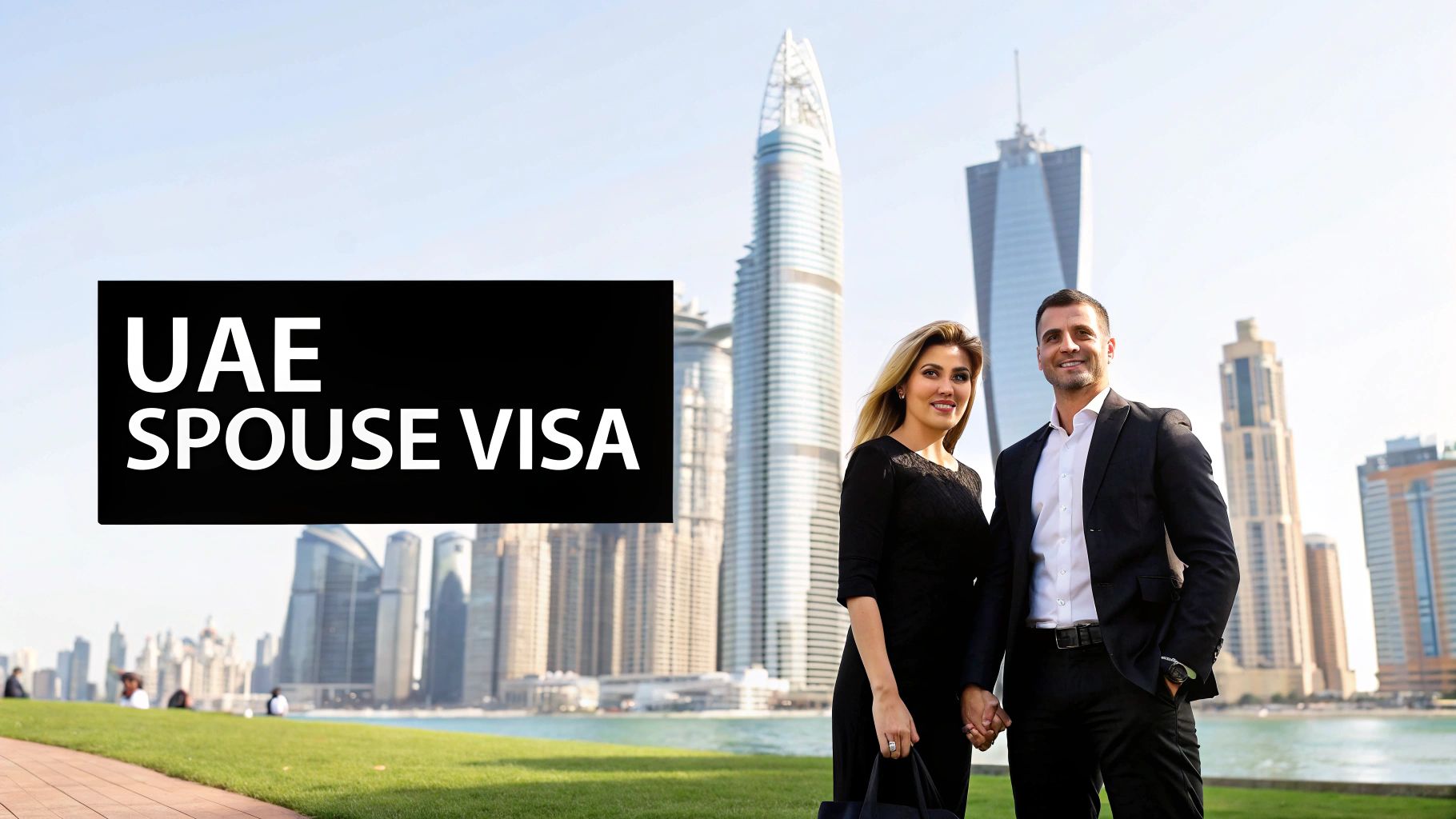 A couple smiling and reviewing documents together, symbolizing the UAE spouse visa process.