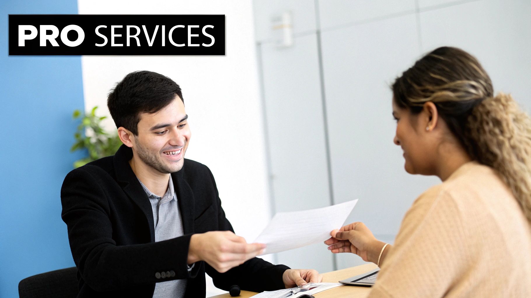 A smiling man hands a document to a woman across a desk, with a 'PRO SERVICES' banner visible.