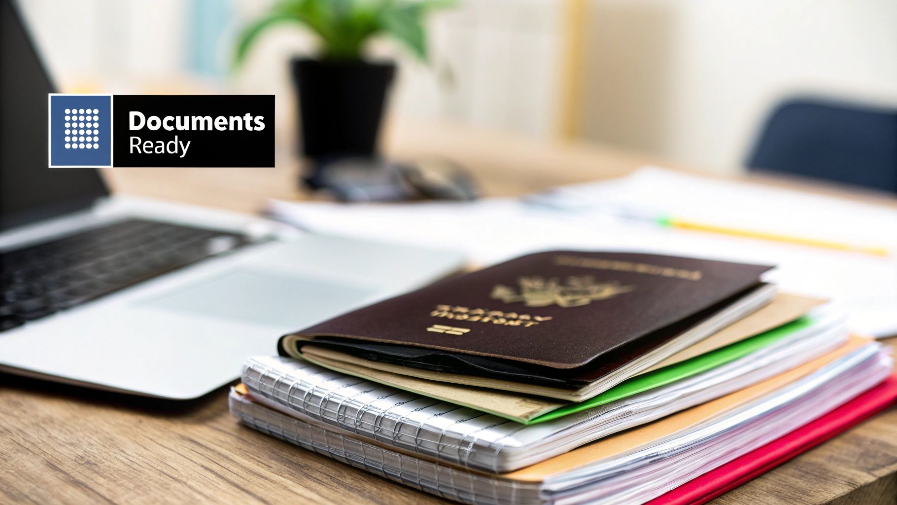 A close-up shot of organised documents, including a passport and official papers, laid out on a desk ready for submission.