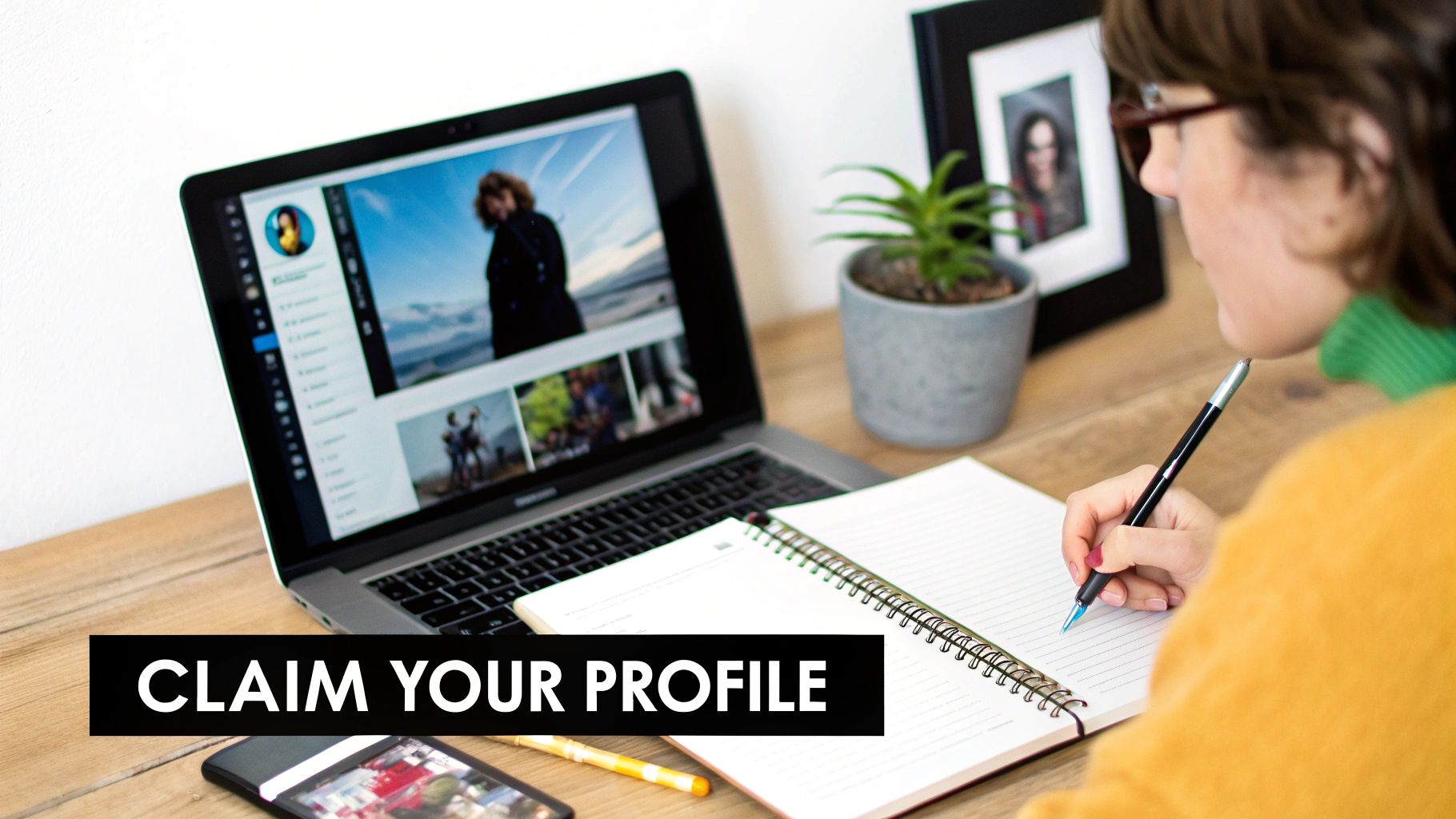 An artist looking at their analytics on a laptop, with a professional and focused expression.