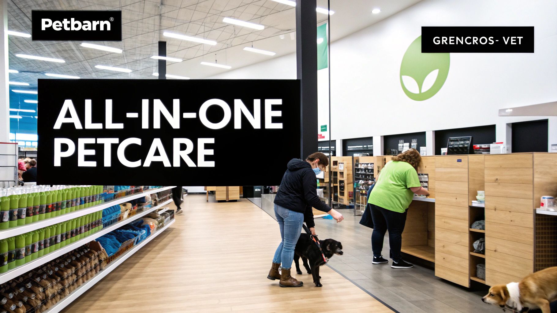 Inside a Petbarn store with an "ALL-IN-ONE PETCARE" sign, customers, and dogs.