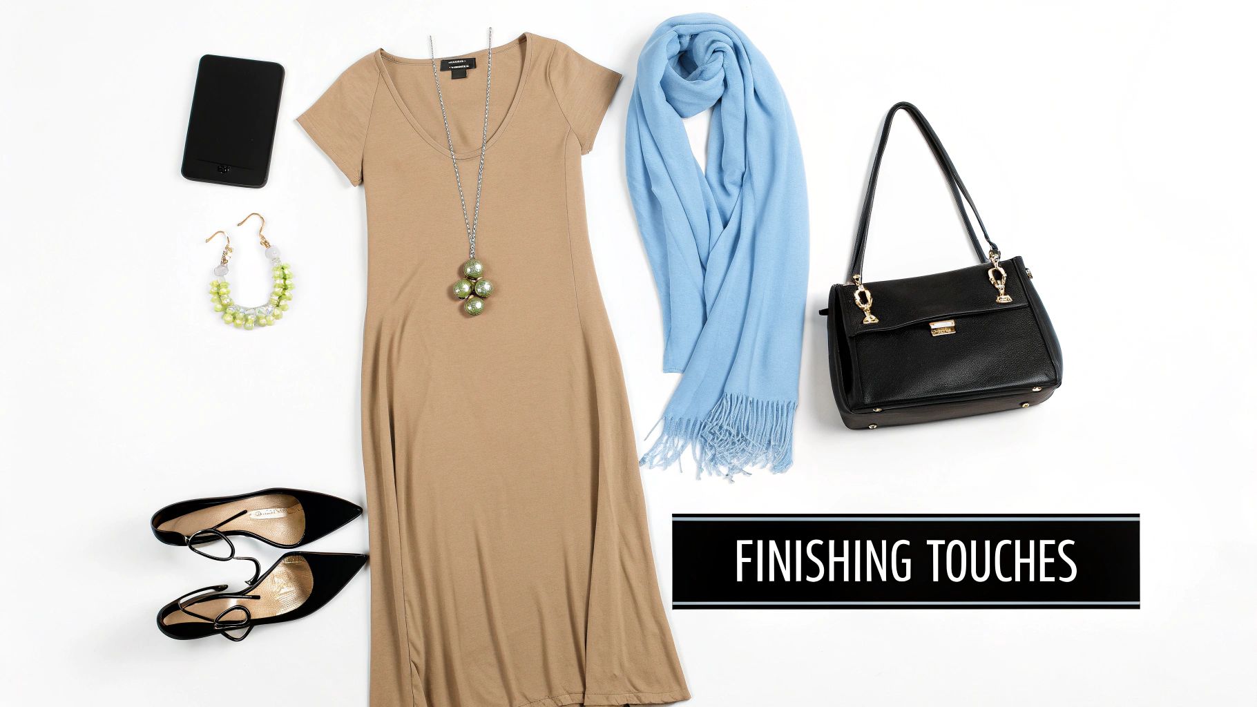 A stylish flat lay featuring a tan maxi dress, blue scarf, black bag, shoes, and green jewelry.