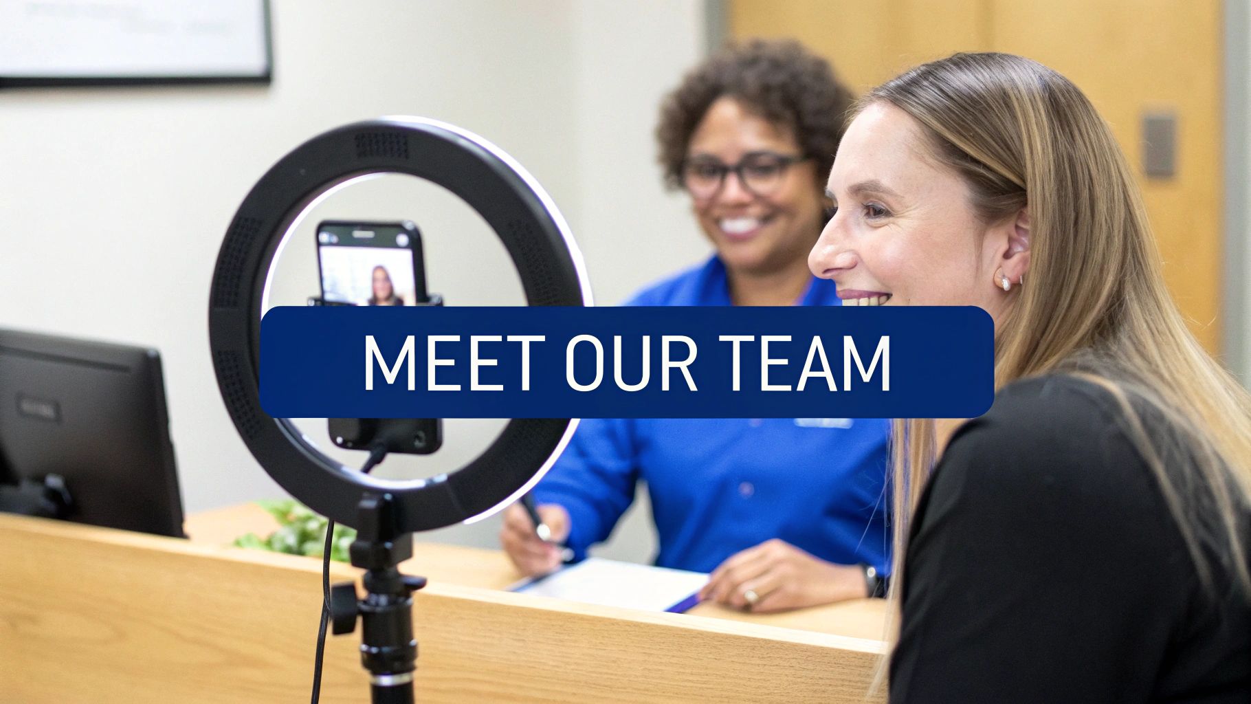 Two smiling women, one recording a video with a ring light and phone, featuring 'MEET OUR TEAM' text.