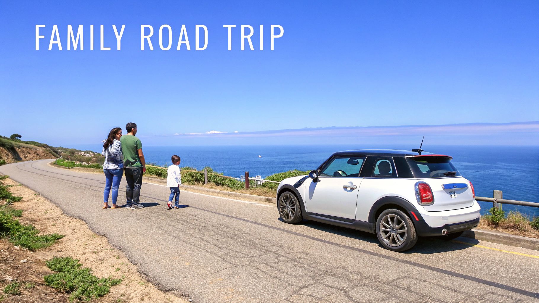 Family of three enjoying scenic coastal ocean view during road trip with white car
