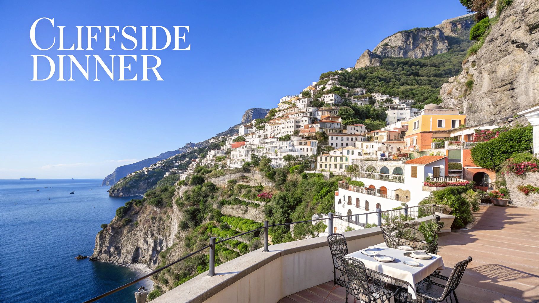 A picturesque cliffside town overlooks the azure sea, with a set dinner table on a sunny balcony.