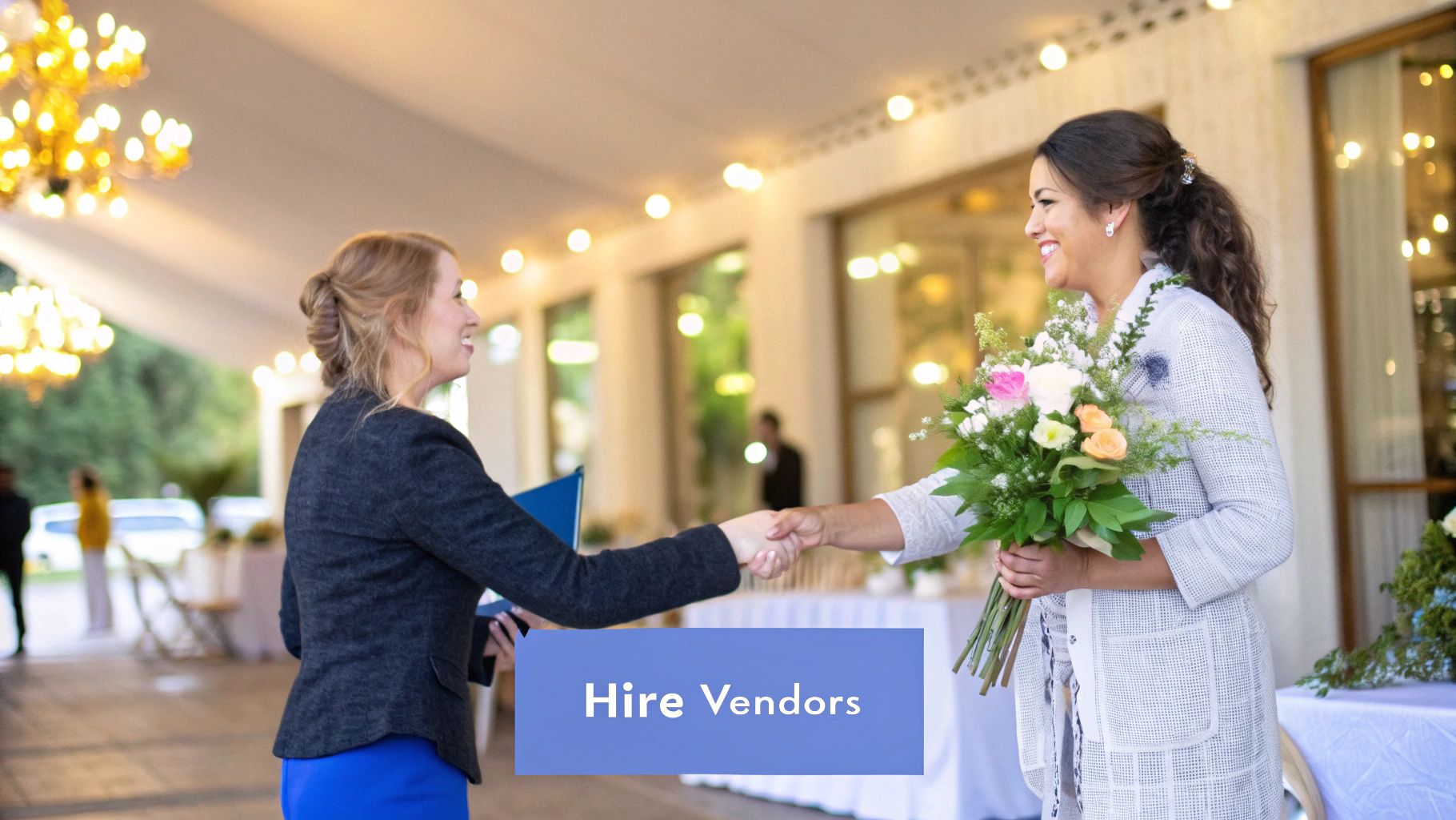 A wedding planner coordinates with vendors at a luxury outdoor wedding reception.