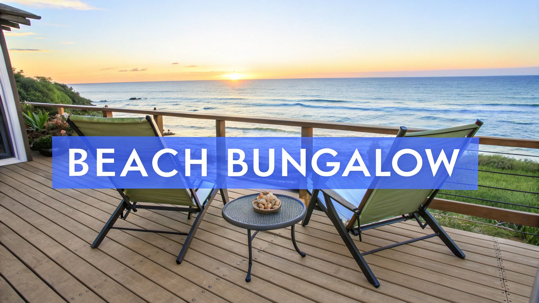 A scenic beach bungalow deck overlooking a beautiful ocean sunset with two lounge chairs and a table.