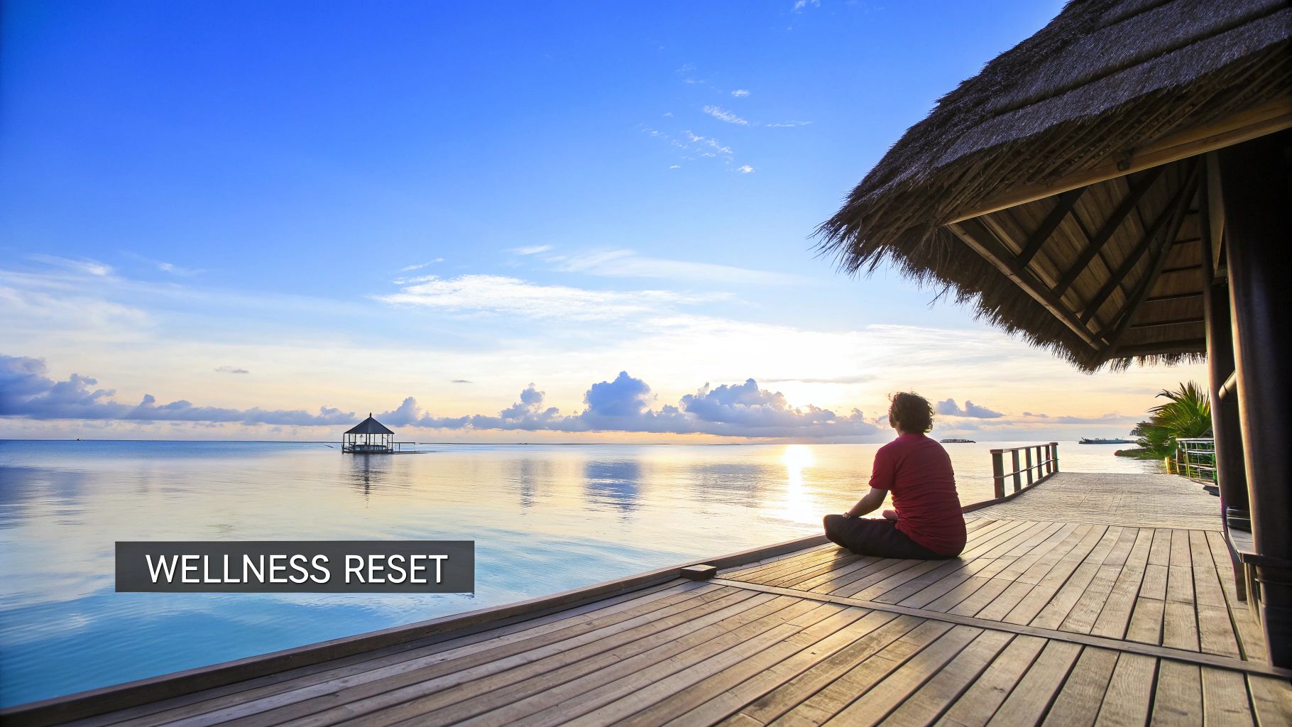 Woman meditating on wooden deck at luxury wellness resort overlooking tranquil ocean at sunrise