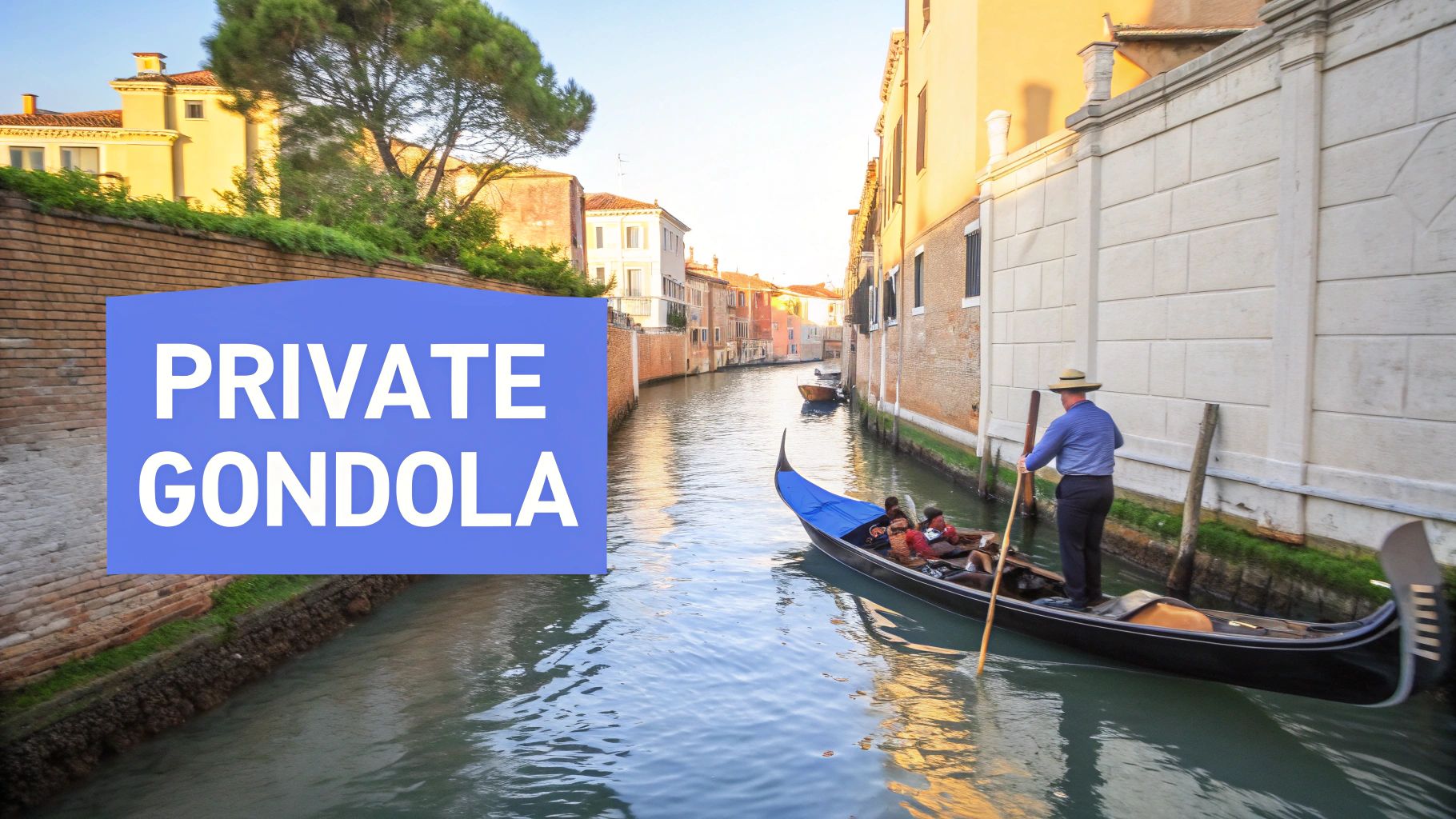 A gondolier steers a private gondola with passengers down a narrow canal in Venice, surrounded by historic buildings.