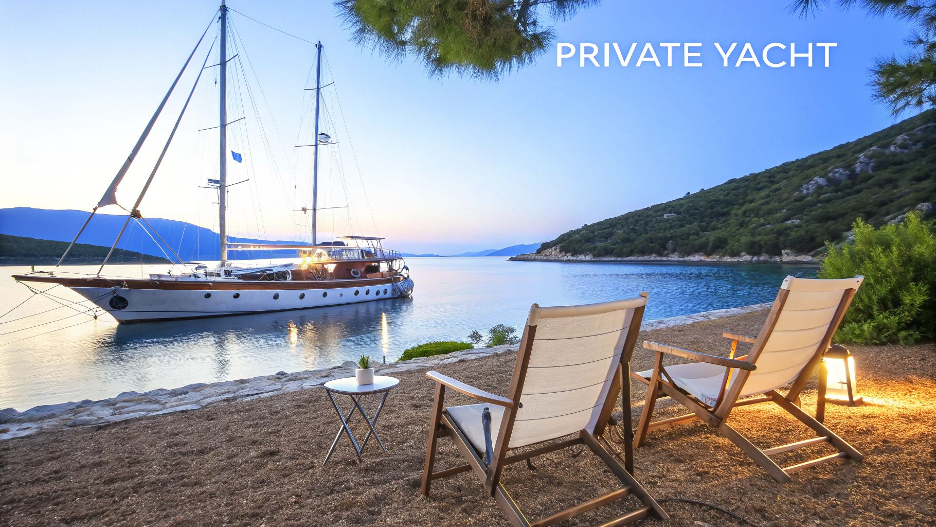 A luxurious private yacht anchored in a calm bay at dusk, with lounge chairs on the sandy shore.