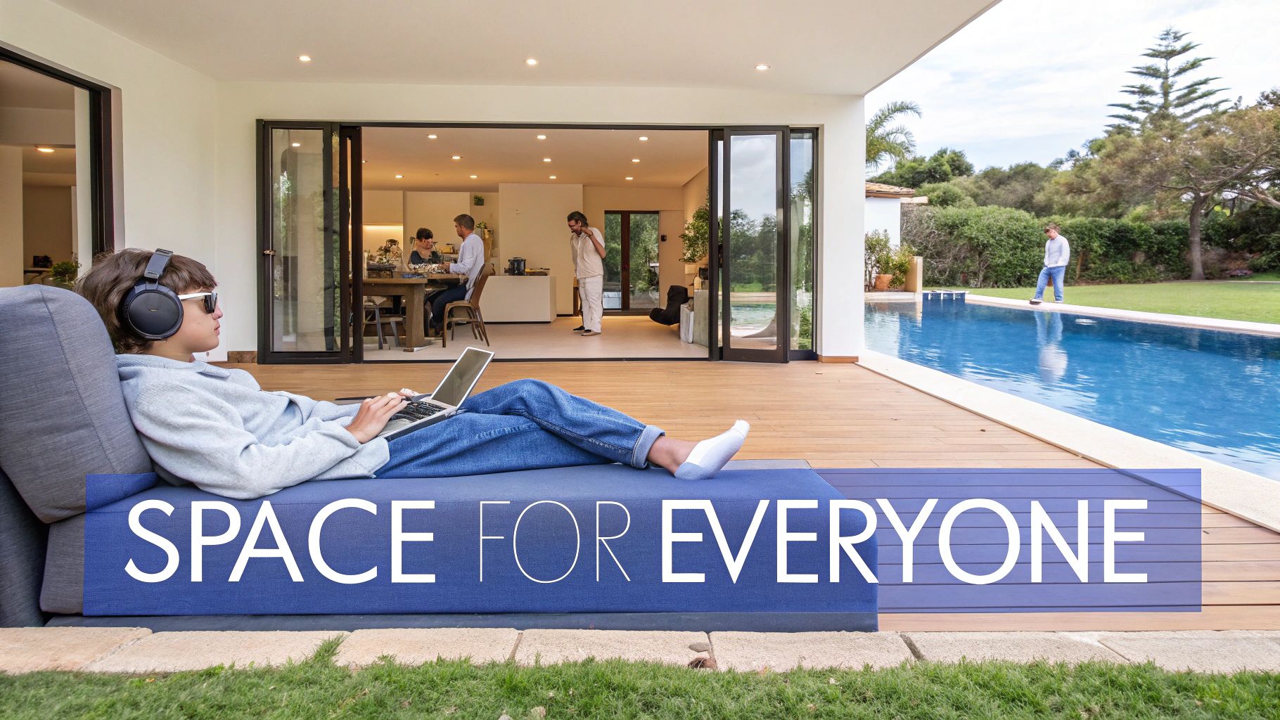A young person relaxes outdoors with headphones and a laptop, while family members gather inside and by the pool.