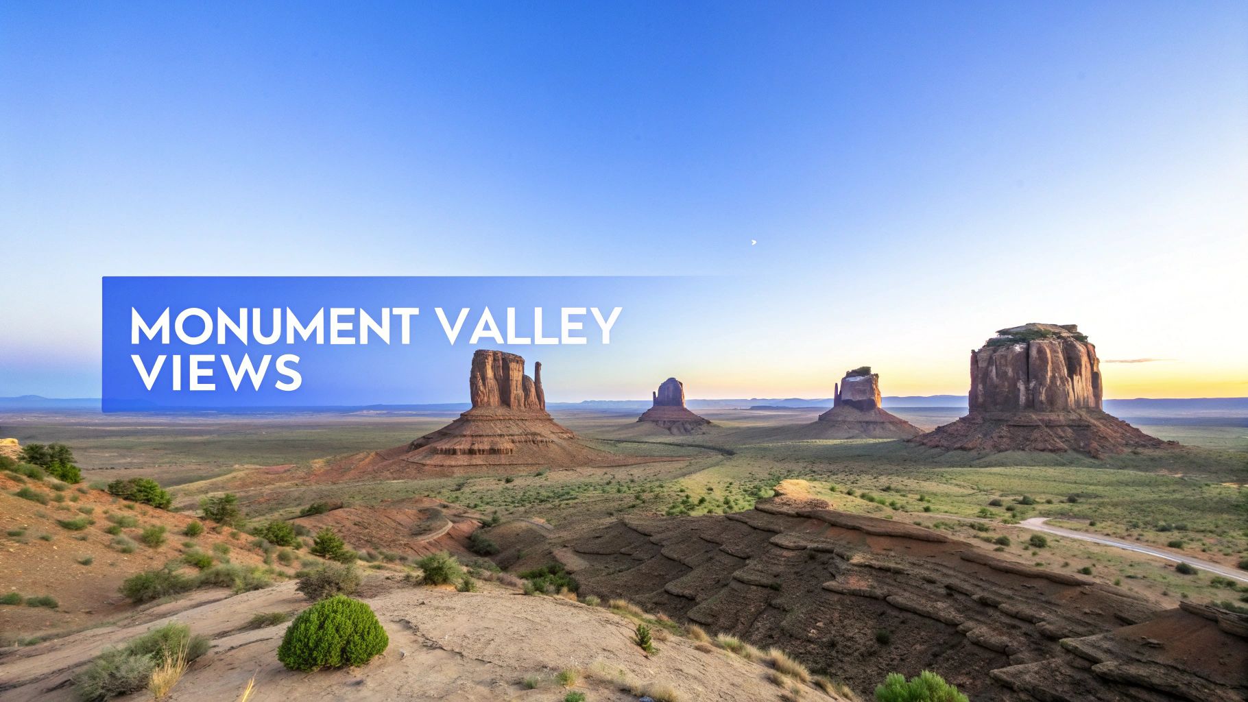 Panoramic view of Monument Valley at sunrise, featuring iconic buttes and 'MONUMENT VALLEY VIEWS' text overlay.