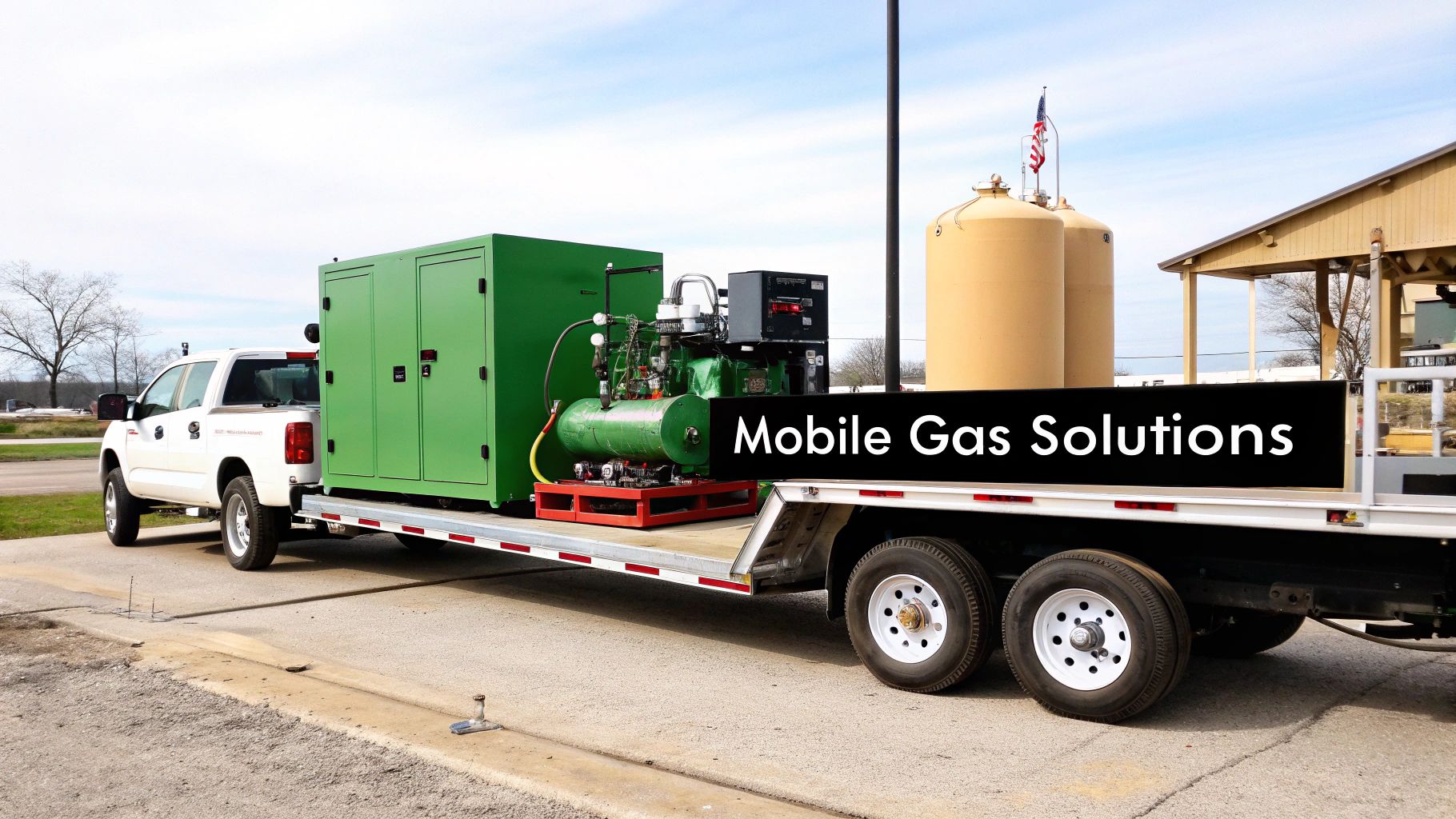 Truck delivering a mobile natural gas compression unit to an industrial site