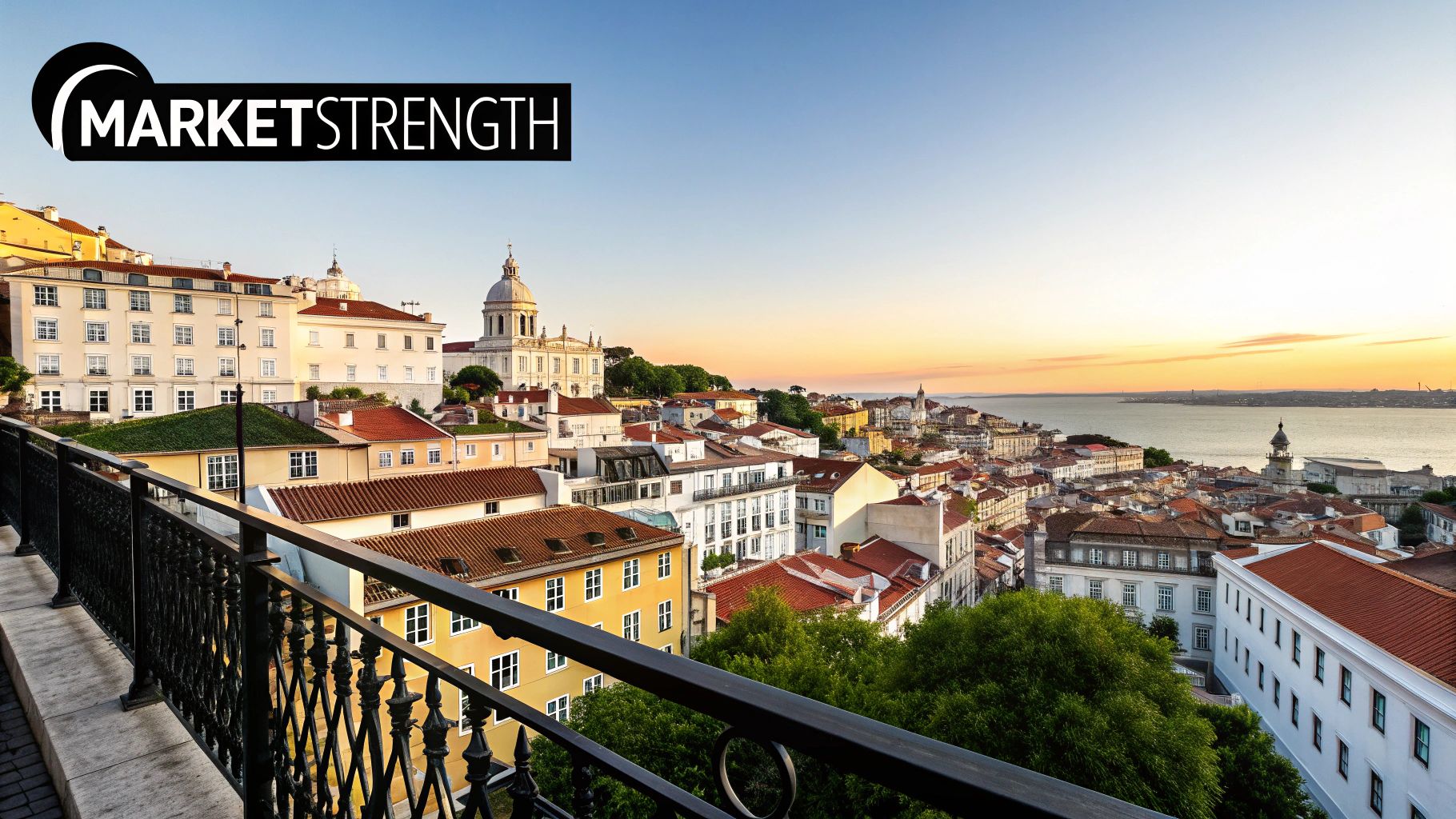 A beautiful panoramic view of a European city, likely Lisbon, at sunset with a river.