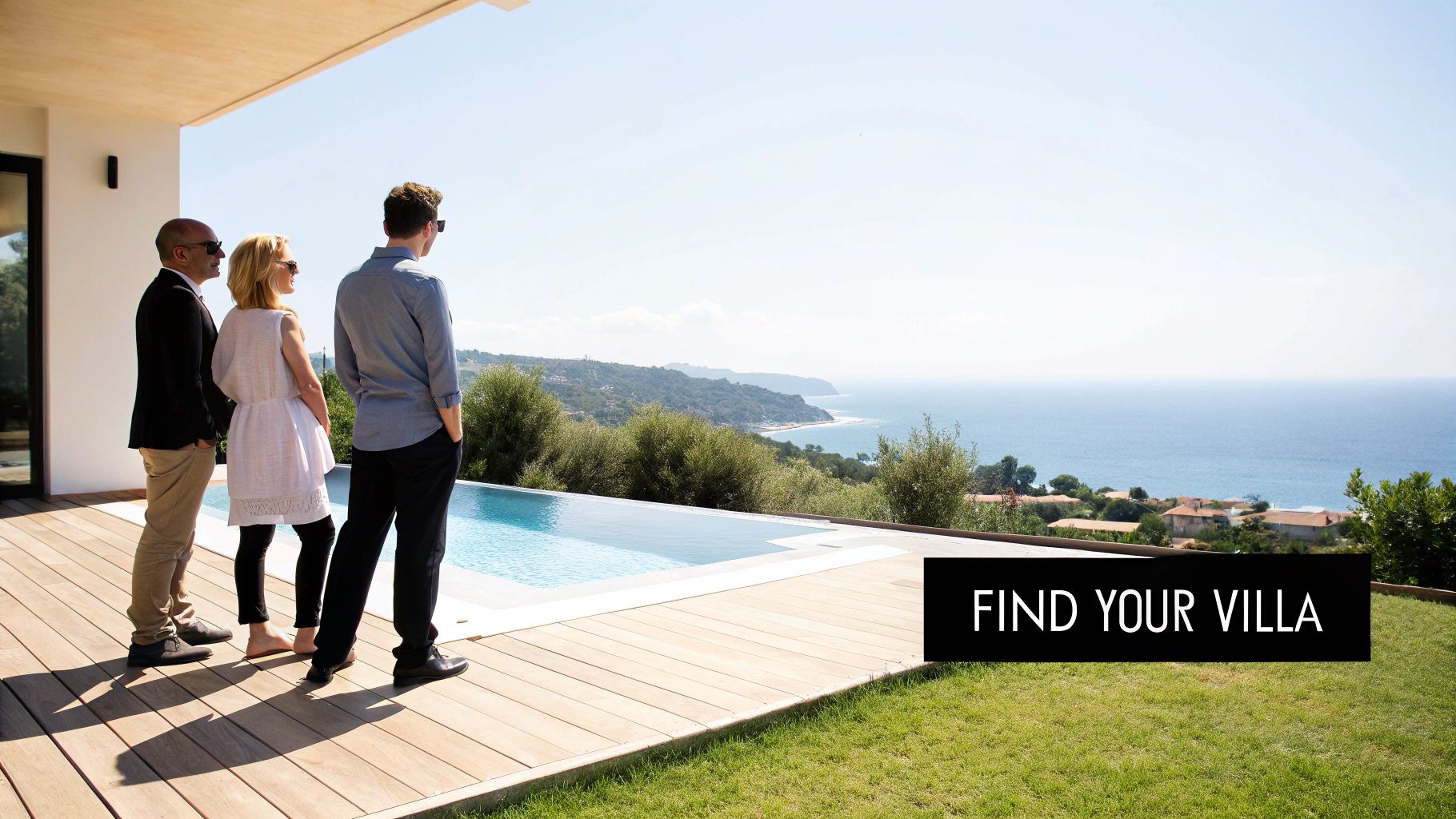 Three people admire the beautiful ocean view from a luxury villa with an infinity pool and wooden deck.
