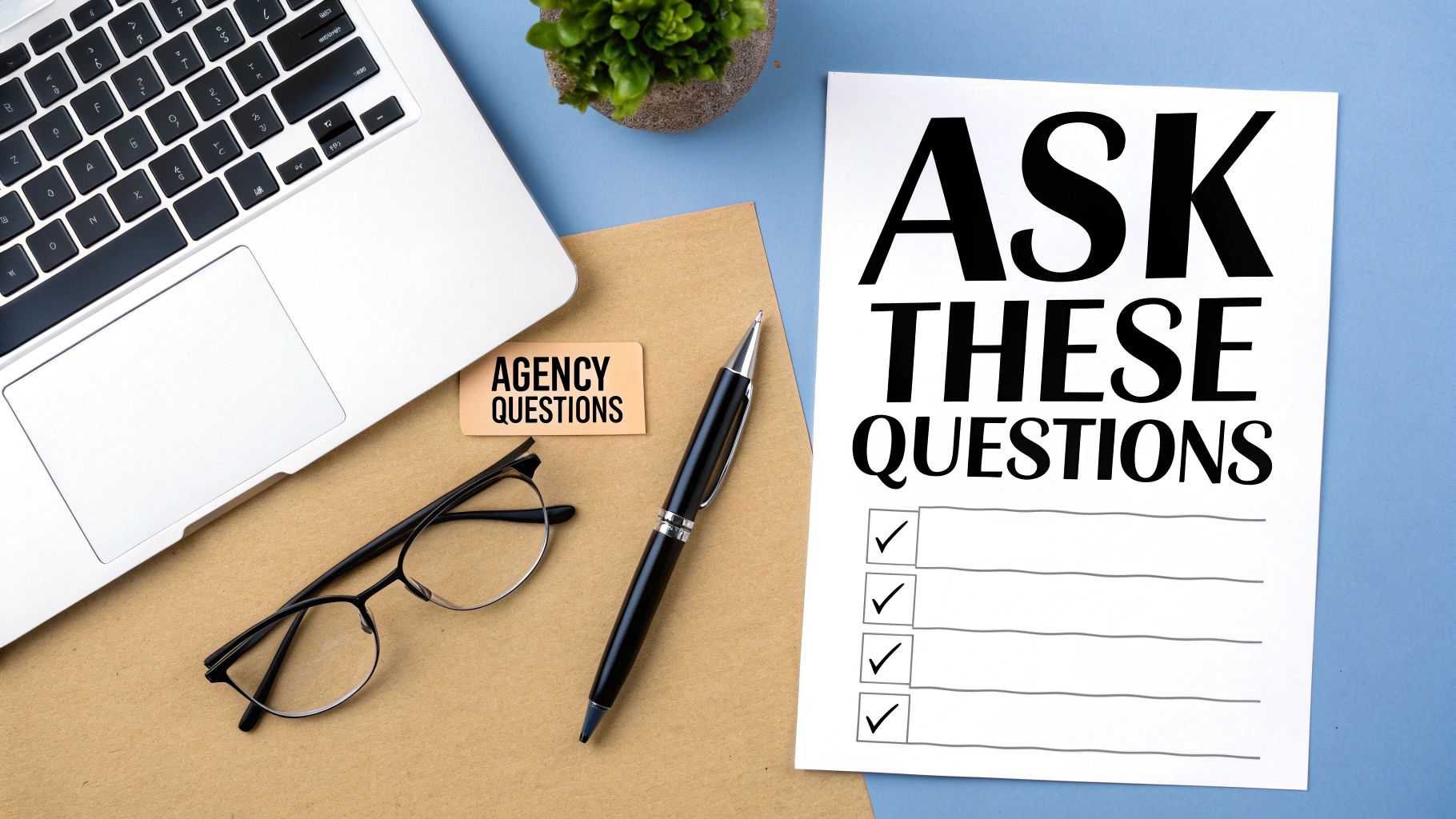 Flat lay showing a laptop, pen, glasses, and notes titled 'AGENCY QUESTIONS' and 'ASK THESE QUESTIONS' with a checklist.
