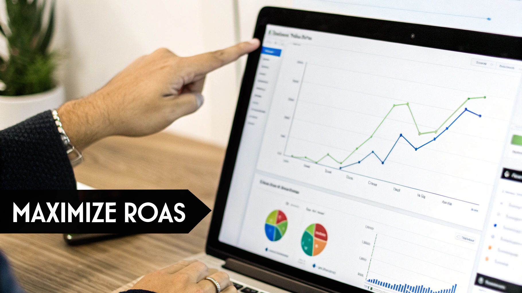 Person analyzing business performance charts on a laptop, aiming to maximize Return on Ad Spend.