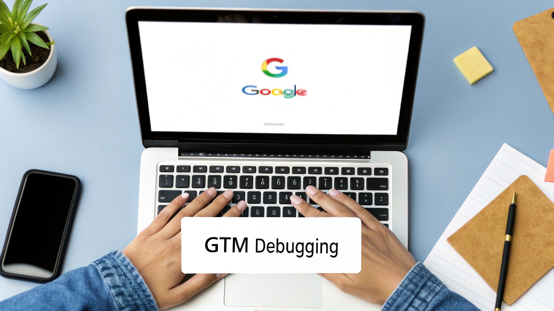 Person using a laptop showing Google on screen with 'GTM Debugging' text overlay on a desk.