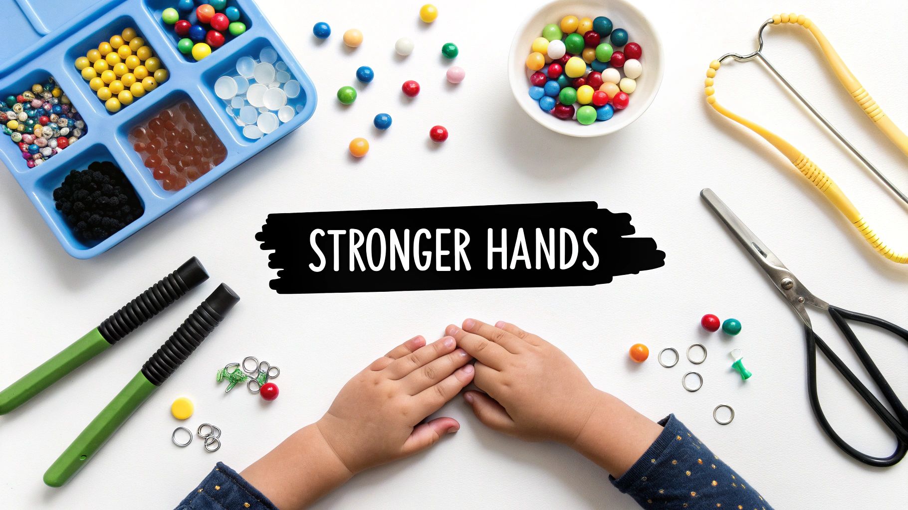 Child's hands with colorful beads, pencil grips, and occupational therapy tools for hand strengthening.