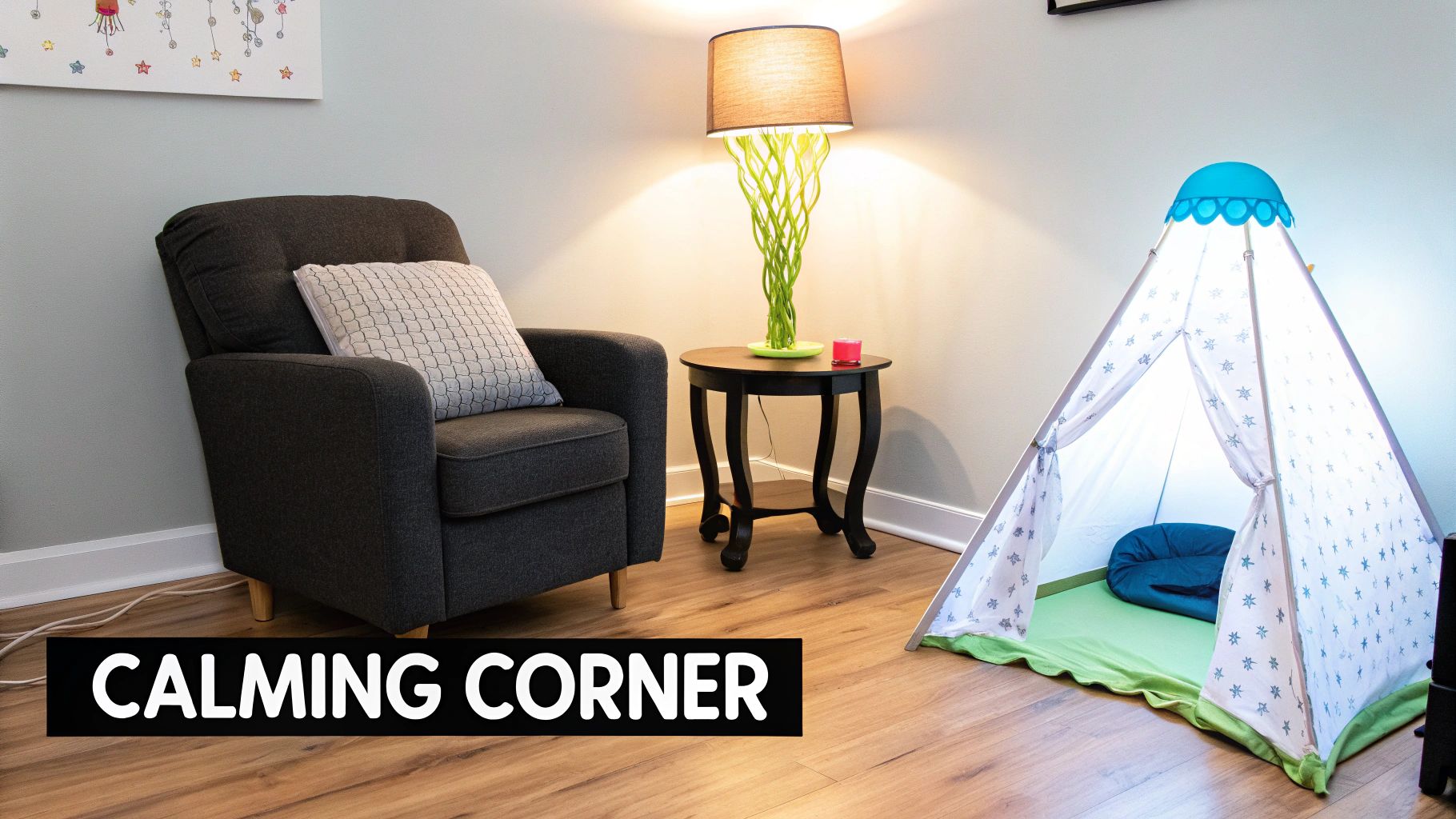A cozy calming corner featuring a grey armchair, a glowing lamp on a side table, and a child's teepee tent.