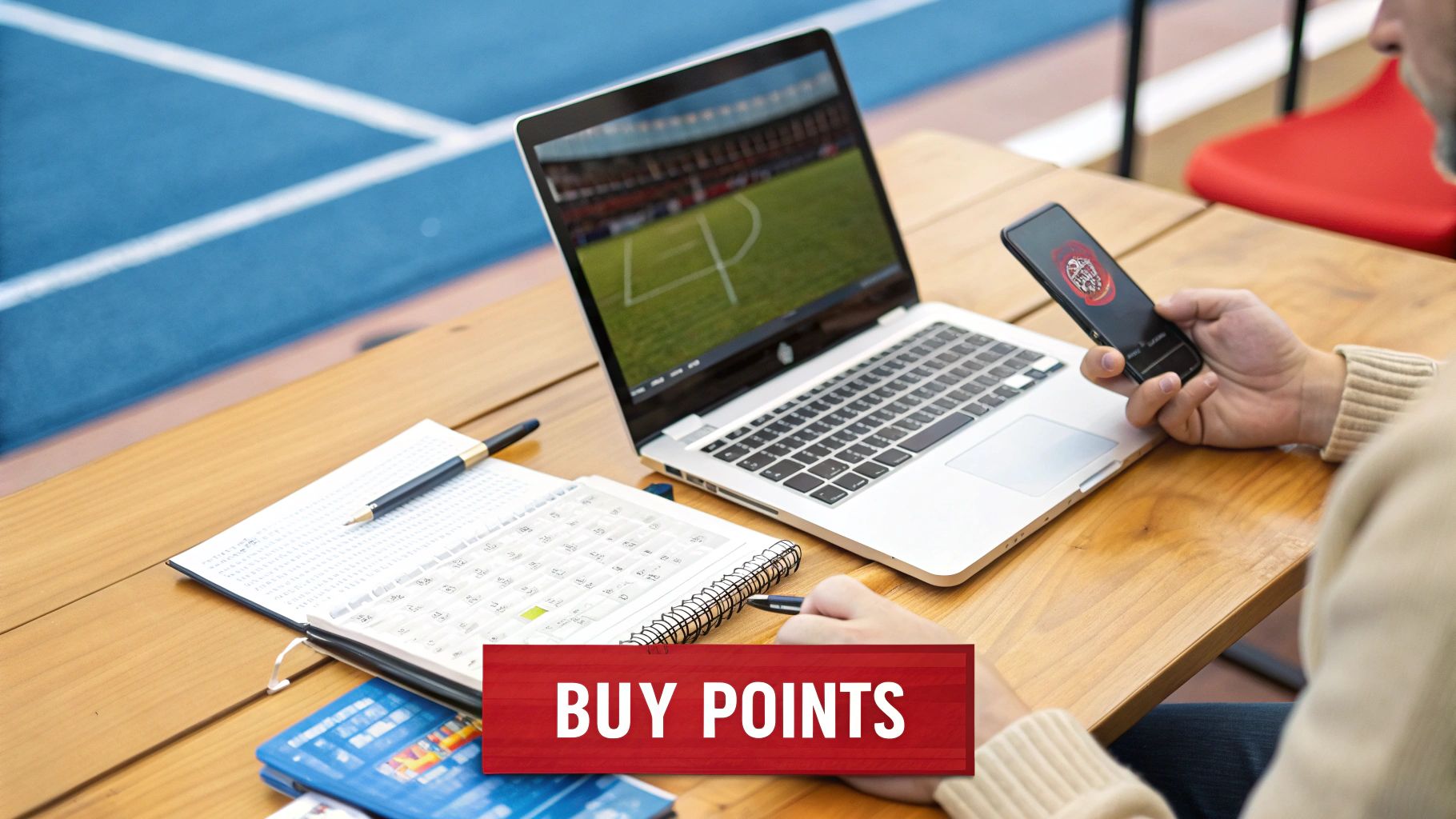 A bettor using a laptop to buy points on the BetUS sportsbook website, with a clear 'BUY POINTS' option highlighted on the screen.