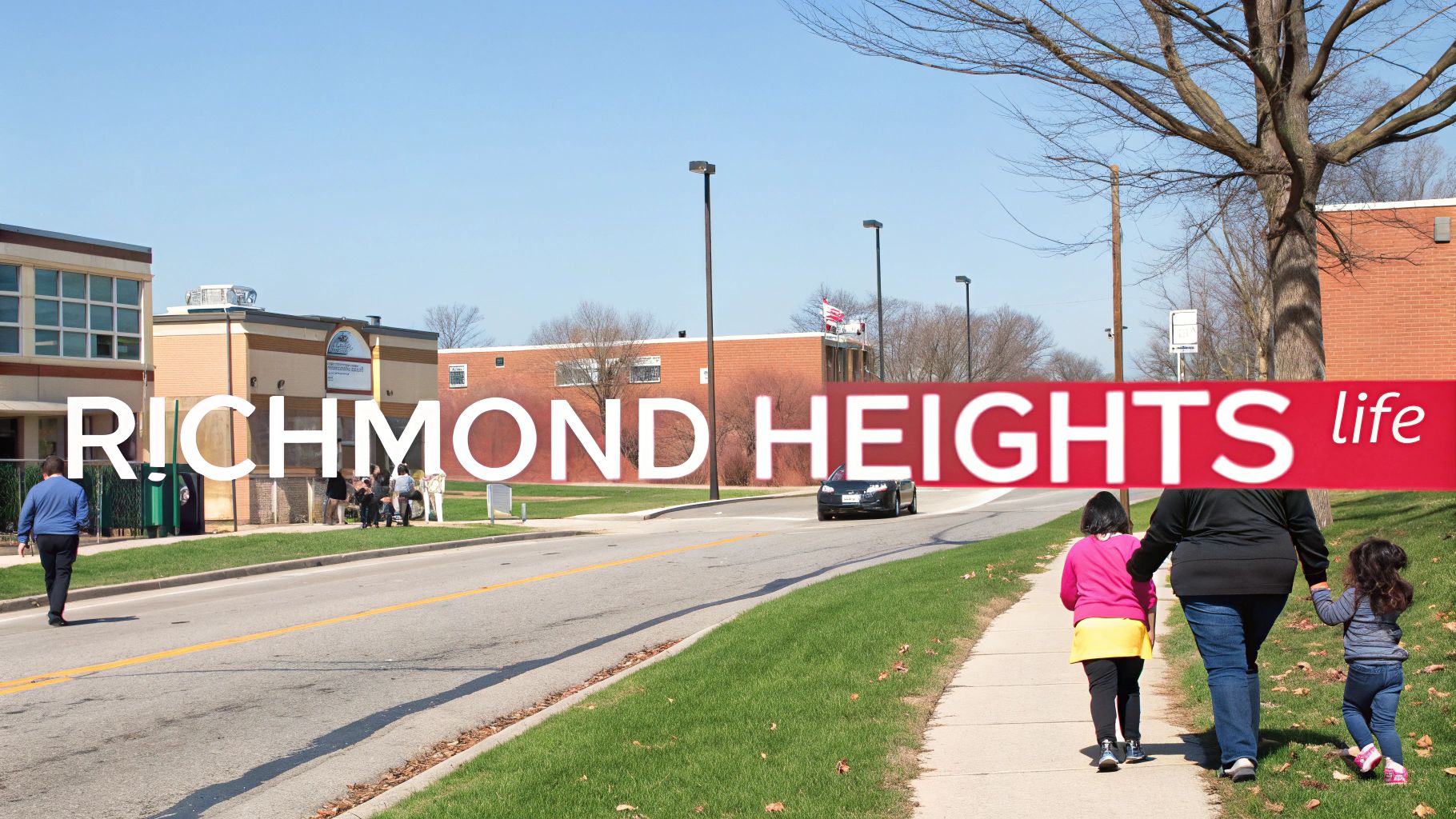 A sunny street scene in Richmond Heights with pedestrians, buildings, and a car driving by.