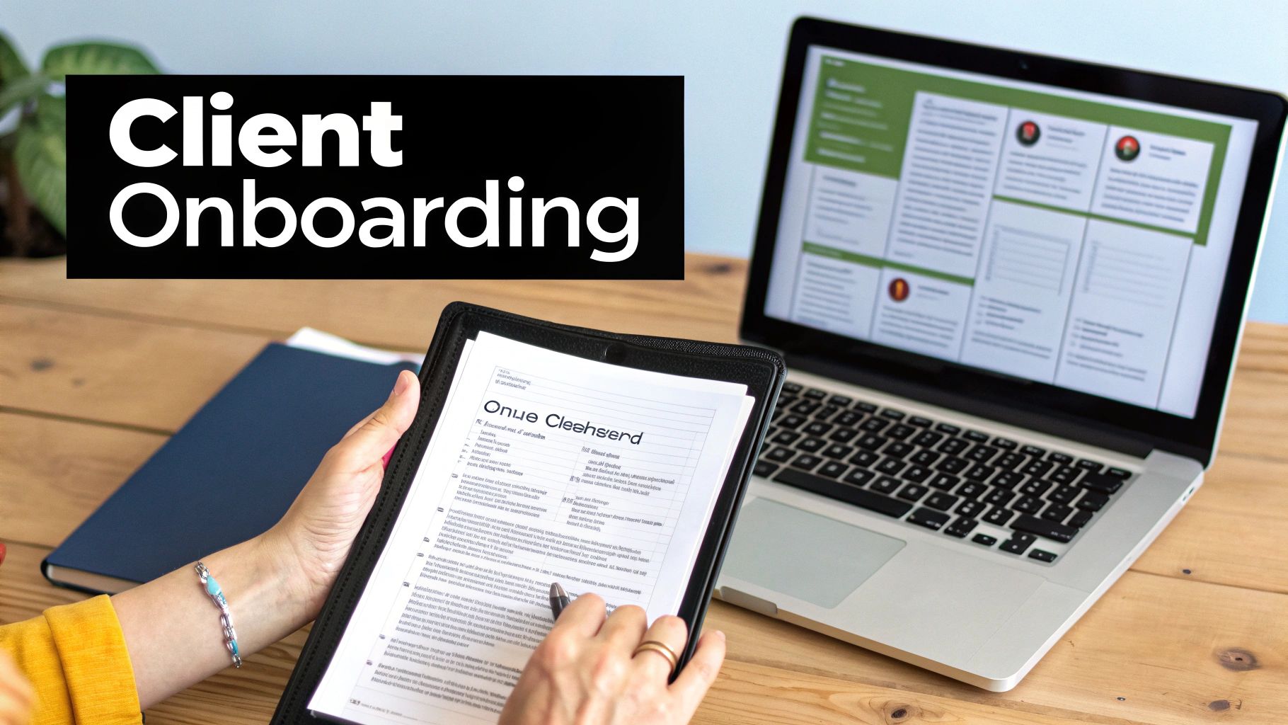 Person reviewing client onboarding documents with a laptop displaying a digital client interface.
