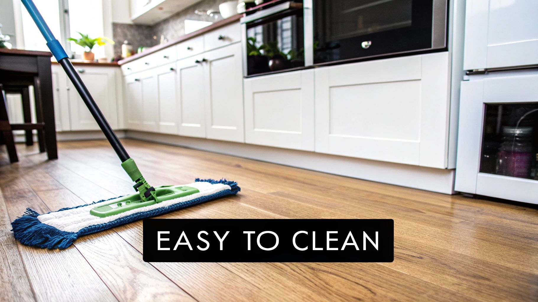 Image showing a person easily cleaning a hardwood floor with a microfiber mop.