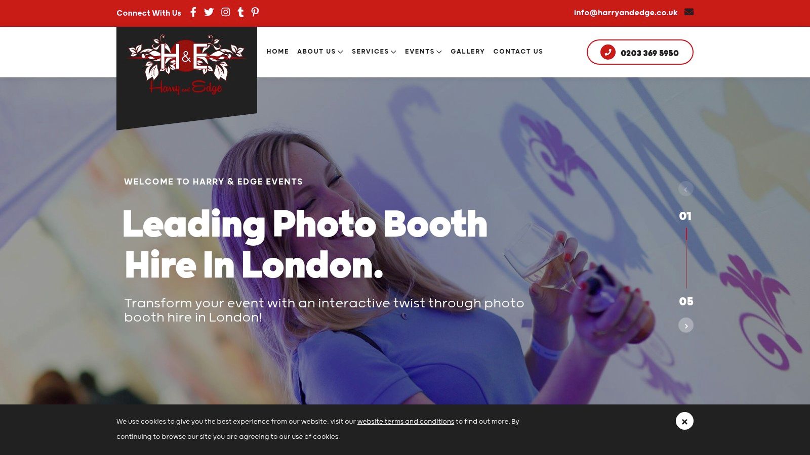 A person interacting with a Harry and Edge social media photo booth at an event