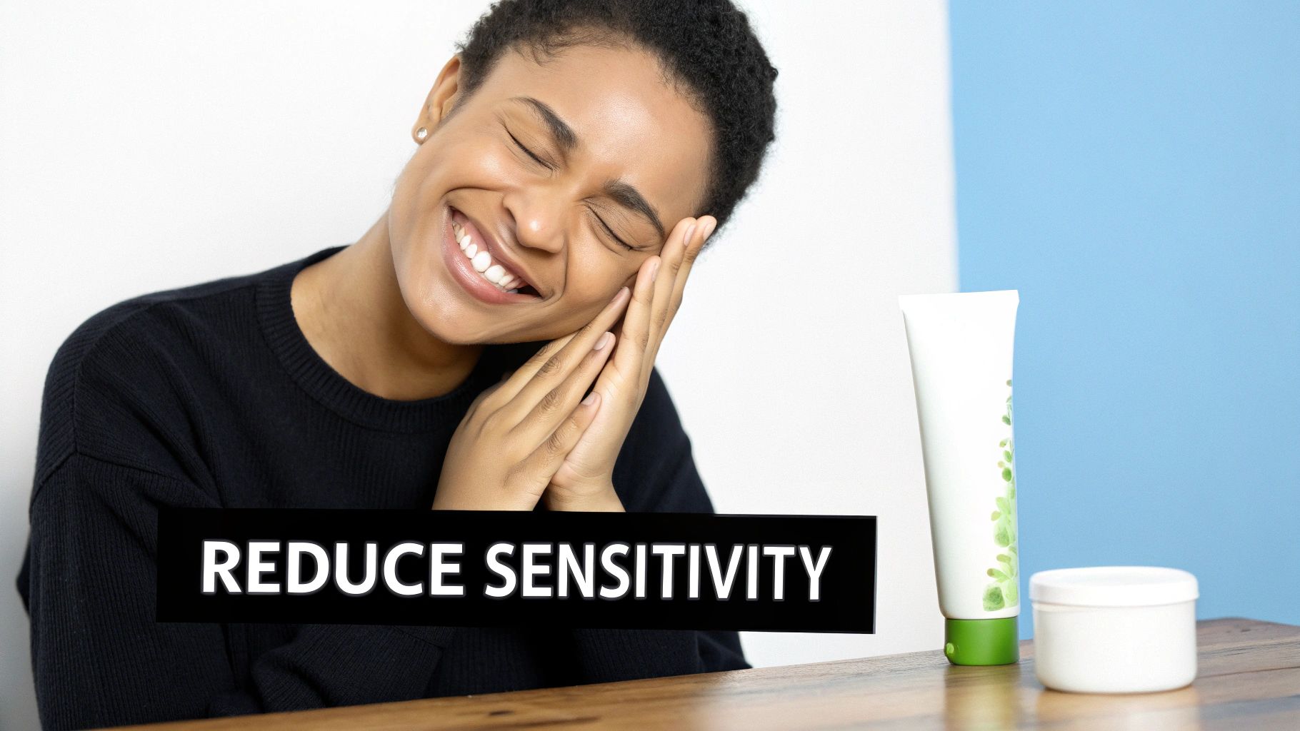 A smiling woman with closed eyes touches her face, next to skincare products and text 'REDUCE SENSITIVITY'.