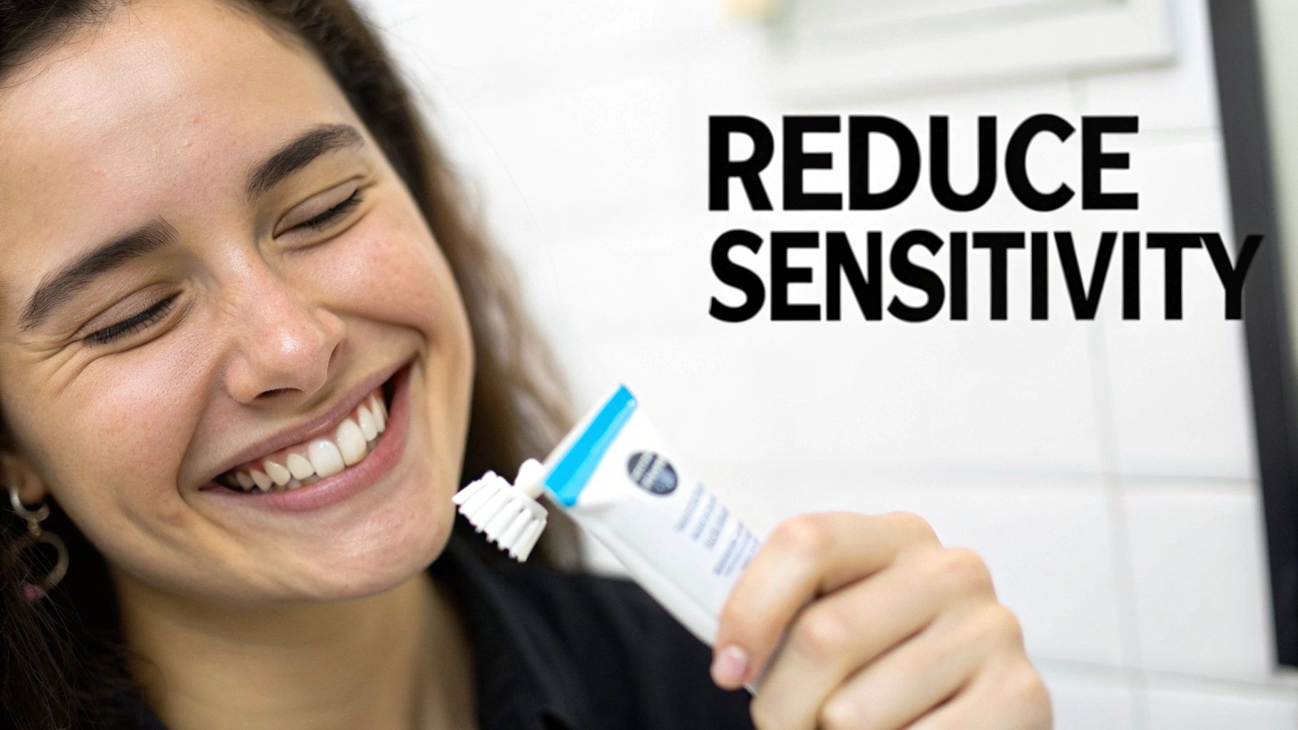 A smiling woman holding a toothbrush with toothpaste, with text 'REDUCE SENSITIVITY' in the background.