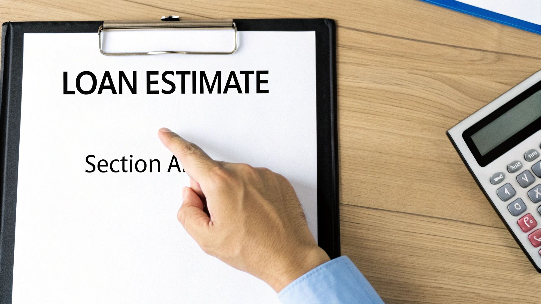 A hand points to a 'LOAN ESTIMATE' document on a clipboard, with a calculator nearby on a wooden desk.