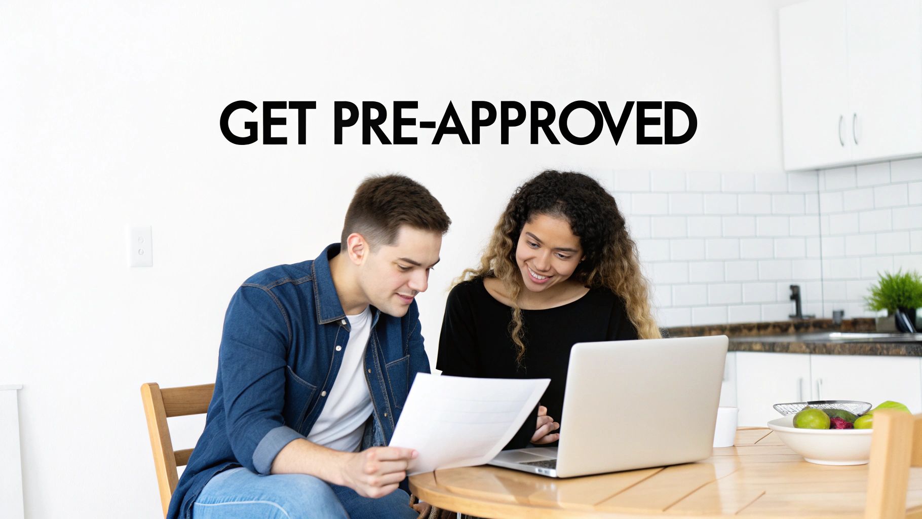 A smiling young couple reviews documents and uses a laptop, with 'GET PRE-APPROVED' text.