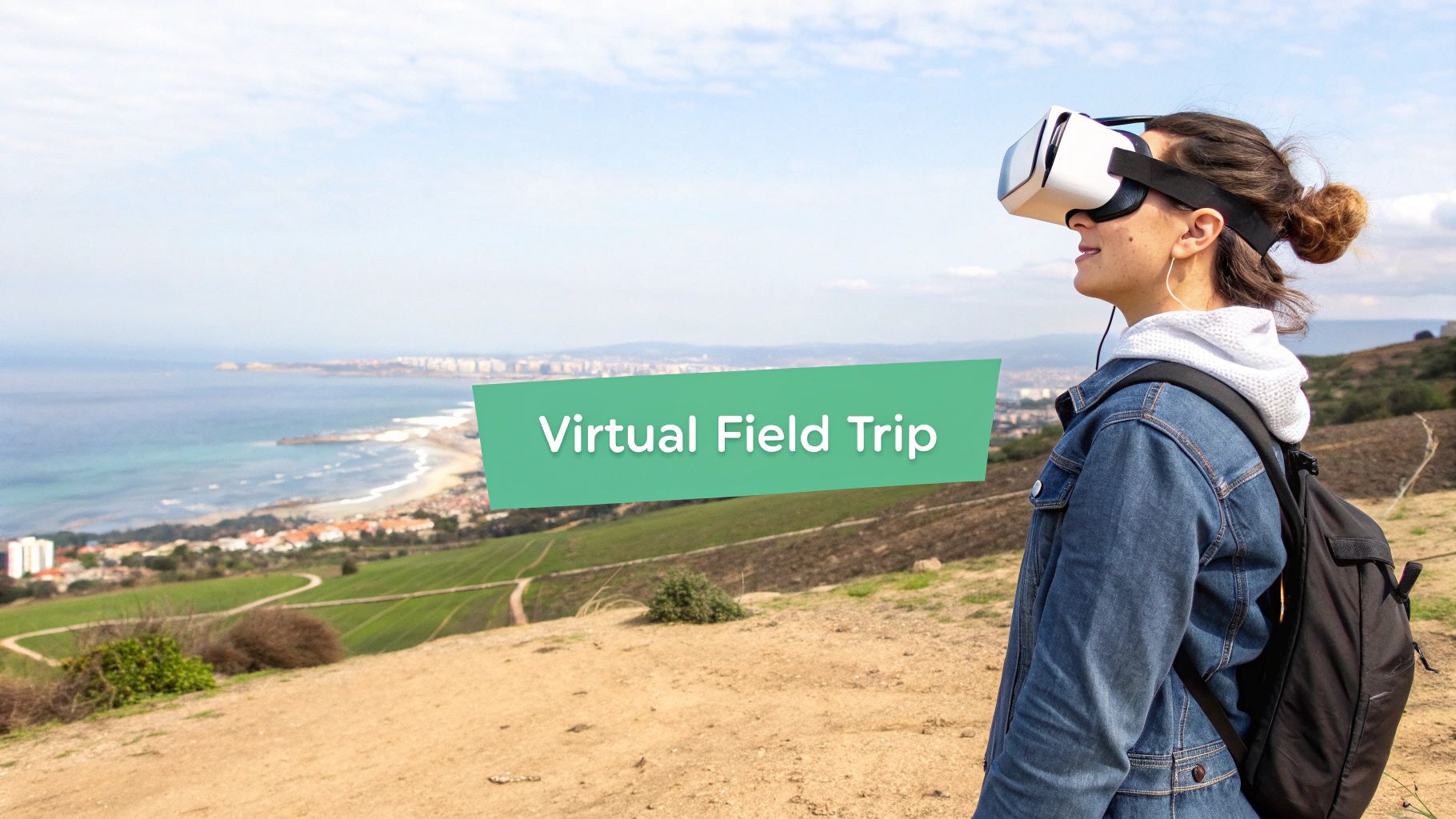 A young woman wearing a VR headset experiences a virtual field trip over a beautiful coastal landscape.